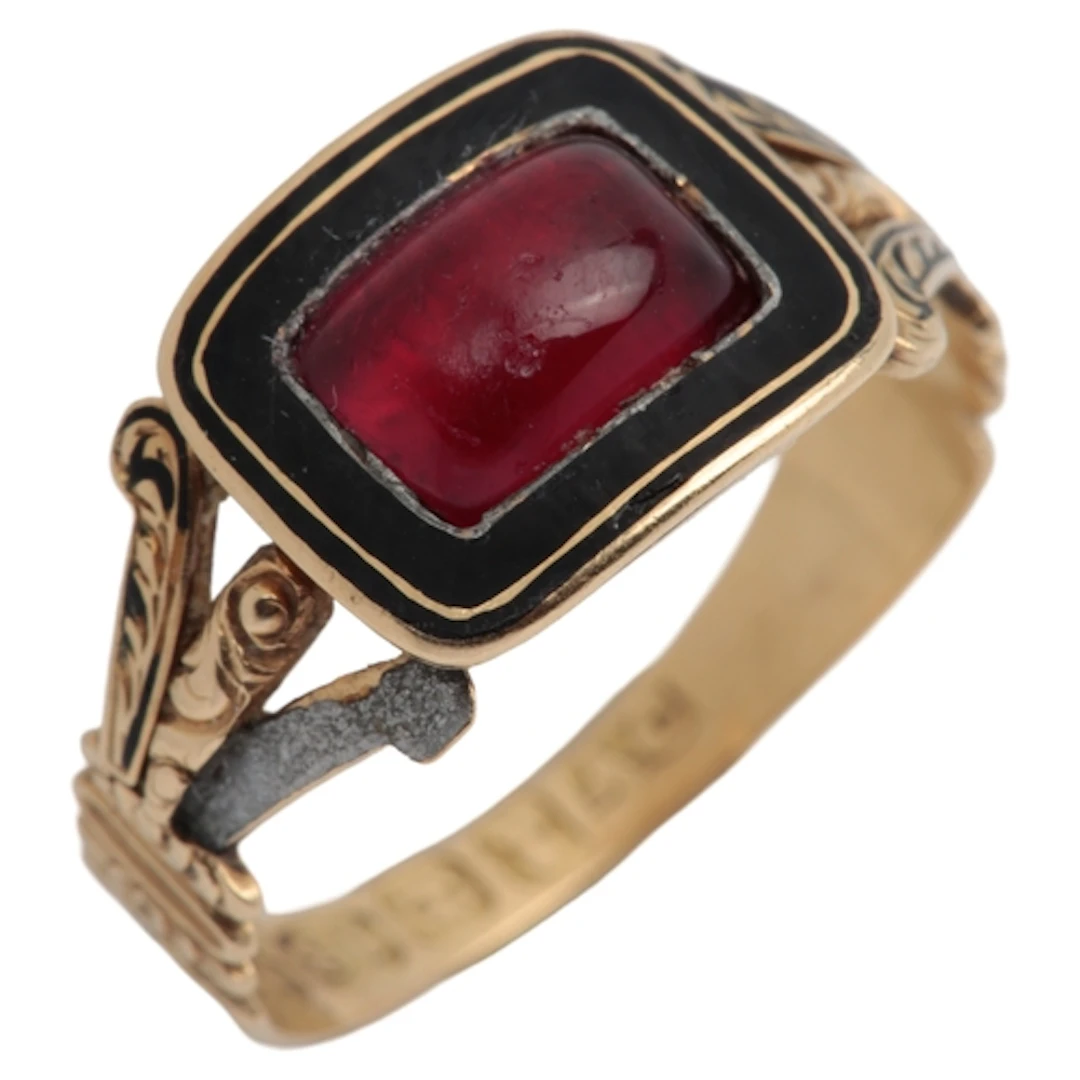 A George IV paste and enamel mourning ring, circa 1824, set ...