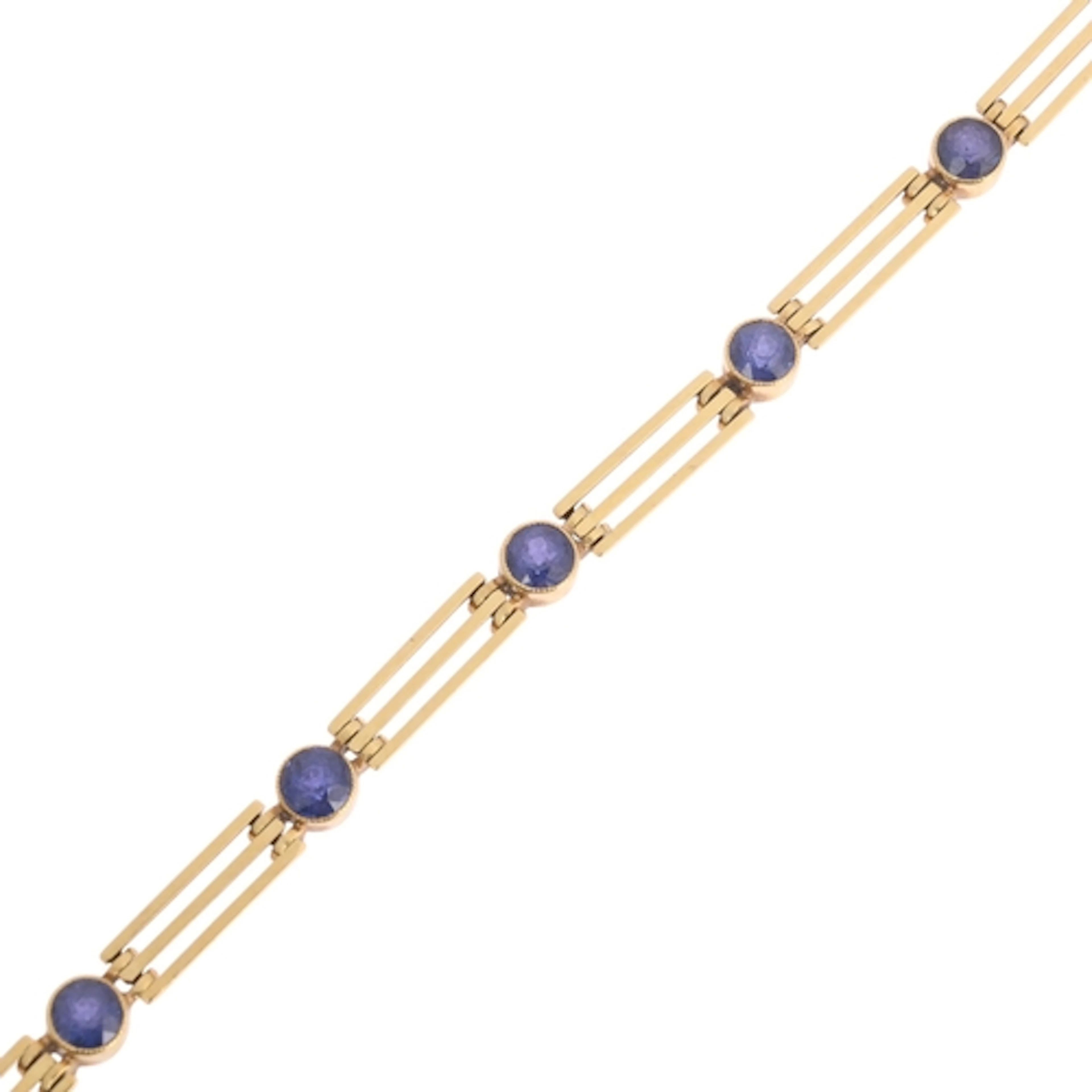 An Edwardian 15ct gold sapphire line bracelet, circa 1905, c...