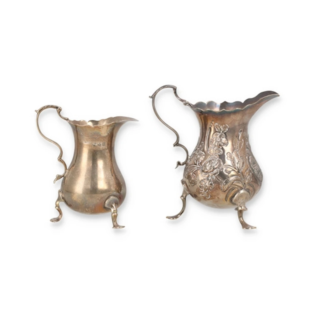 A GEORGE III SILVER PEAR SHAPE CREAM JUG, LONDON CIRCA. 1770...