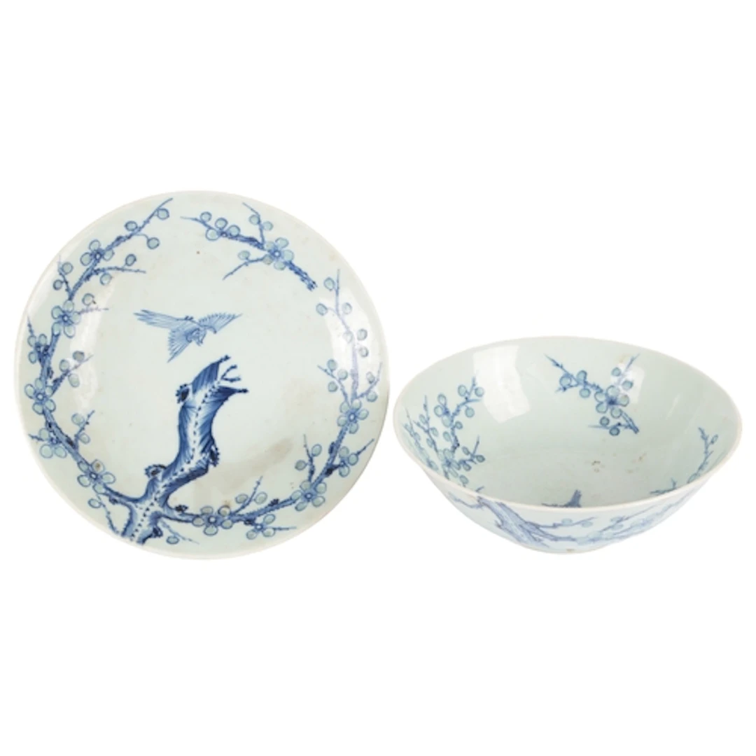 A Chinese blue and white 'ling long' decorated 'prunus' bowl...