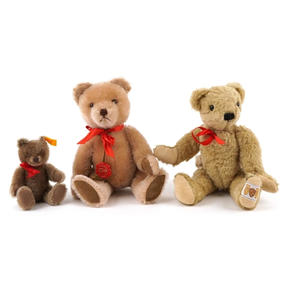 Three collectable teddy bears comprising Steiff, Hermann and...