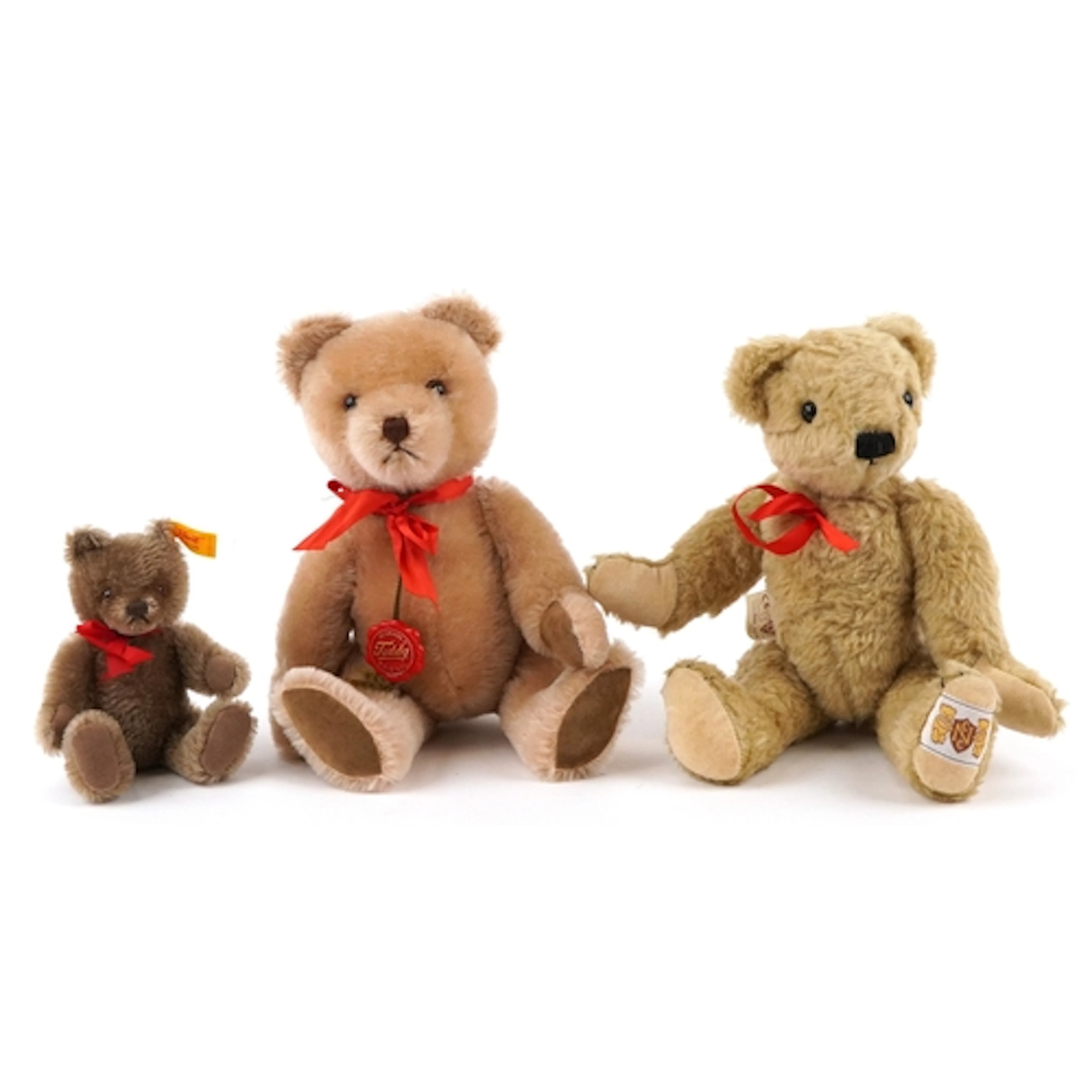 Three collectable teddy bears comprising Steiff, Hermann and...