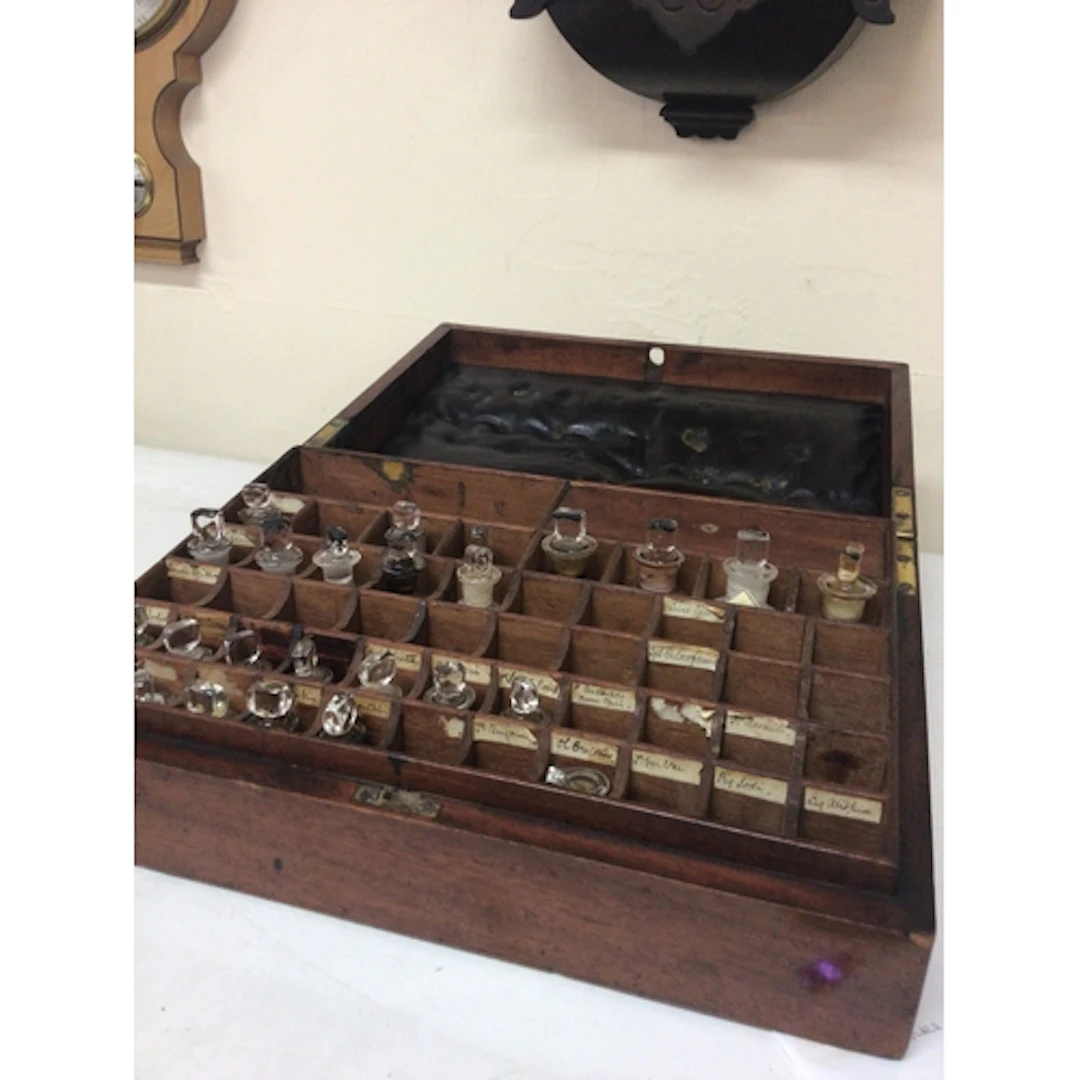 A 19th century mahogany apothecary case with a fitted ...