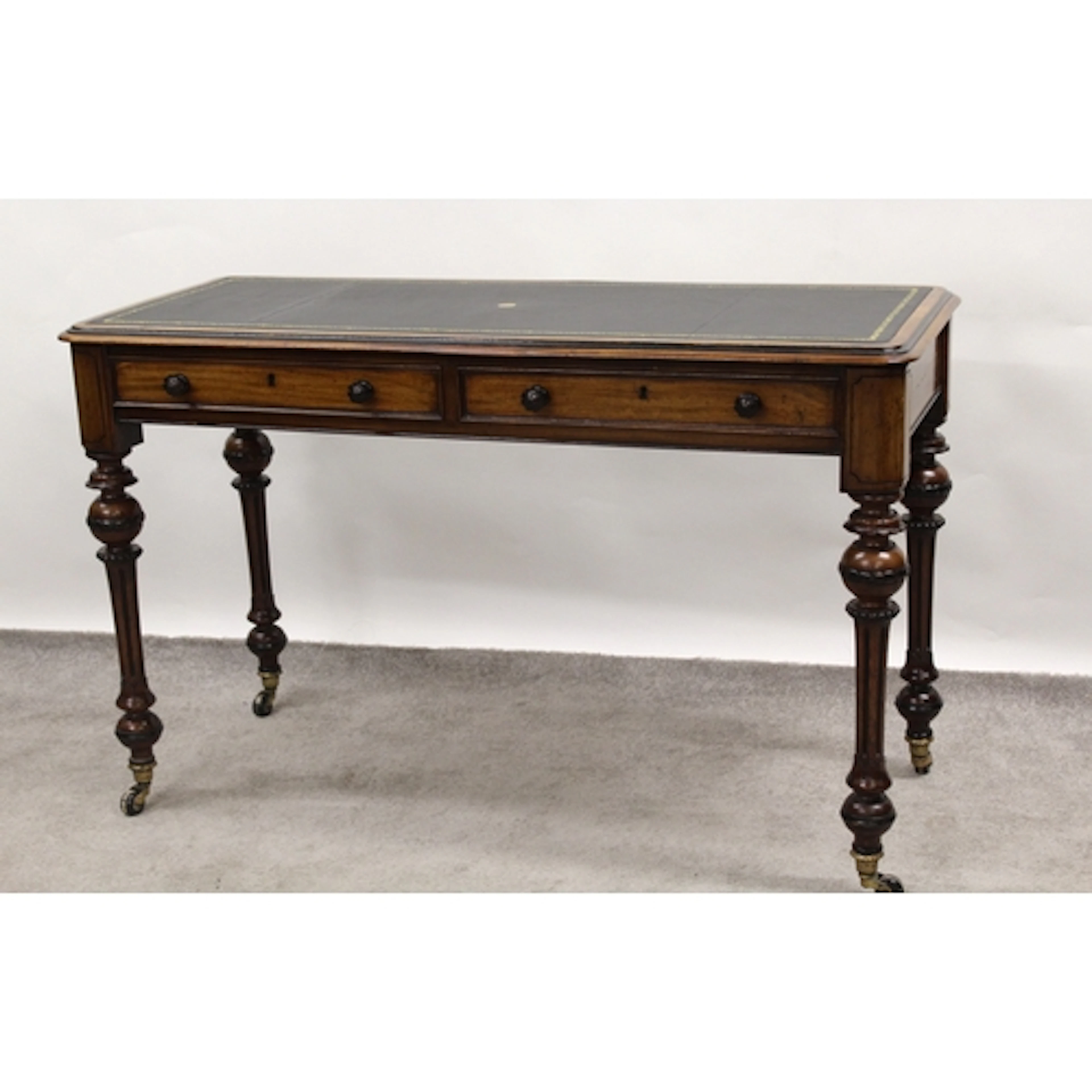 Victorian walnut writing table, the narrow moulded top with ...