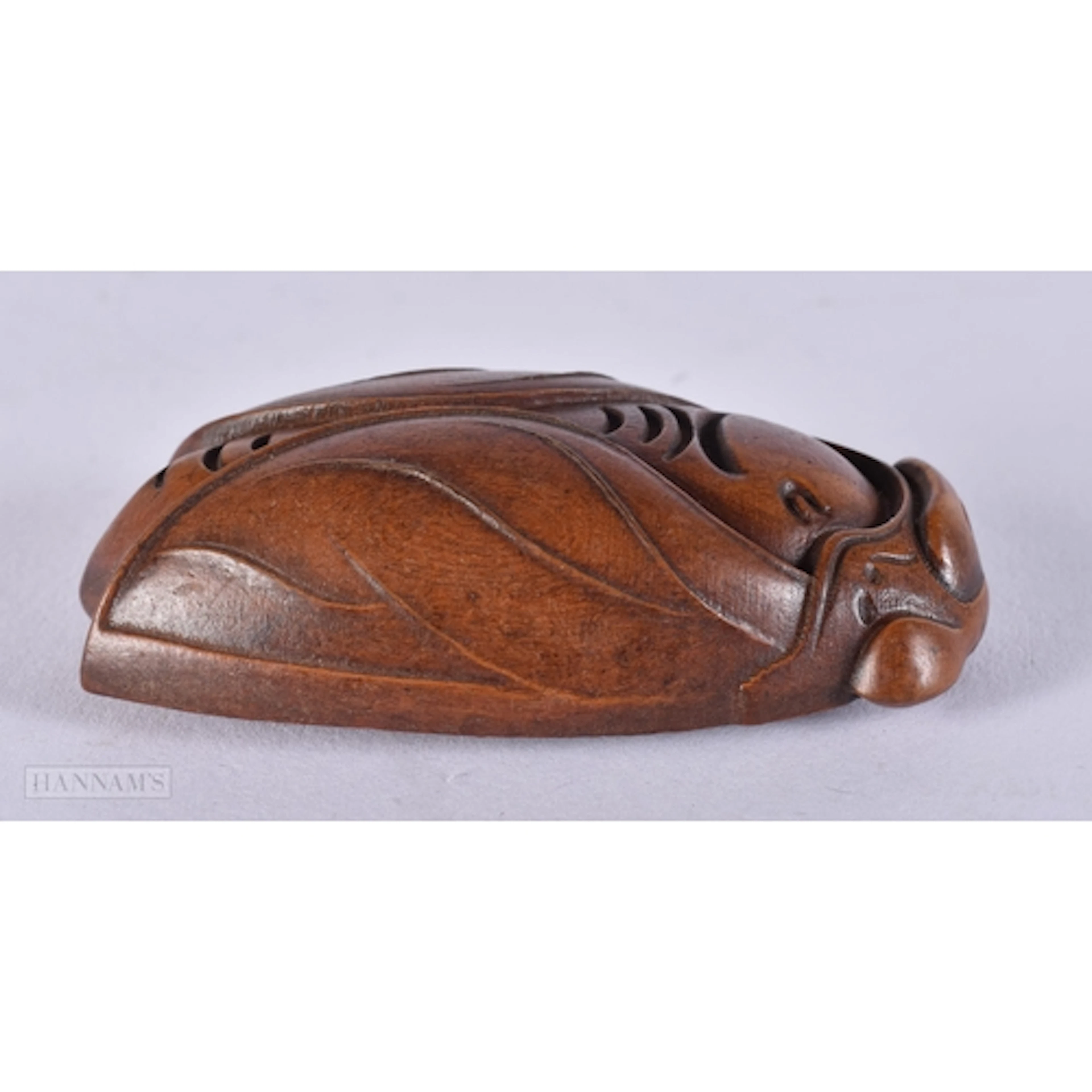 A CARVED WOOD CICADA FLY. 1.9 x 3.8 x 7 cm