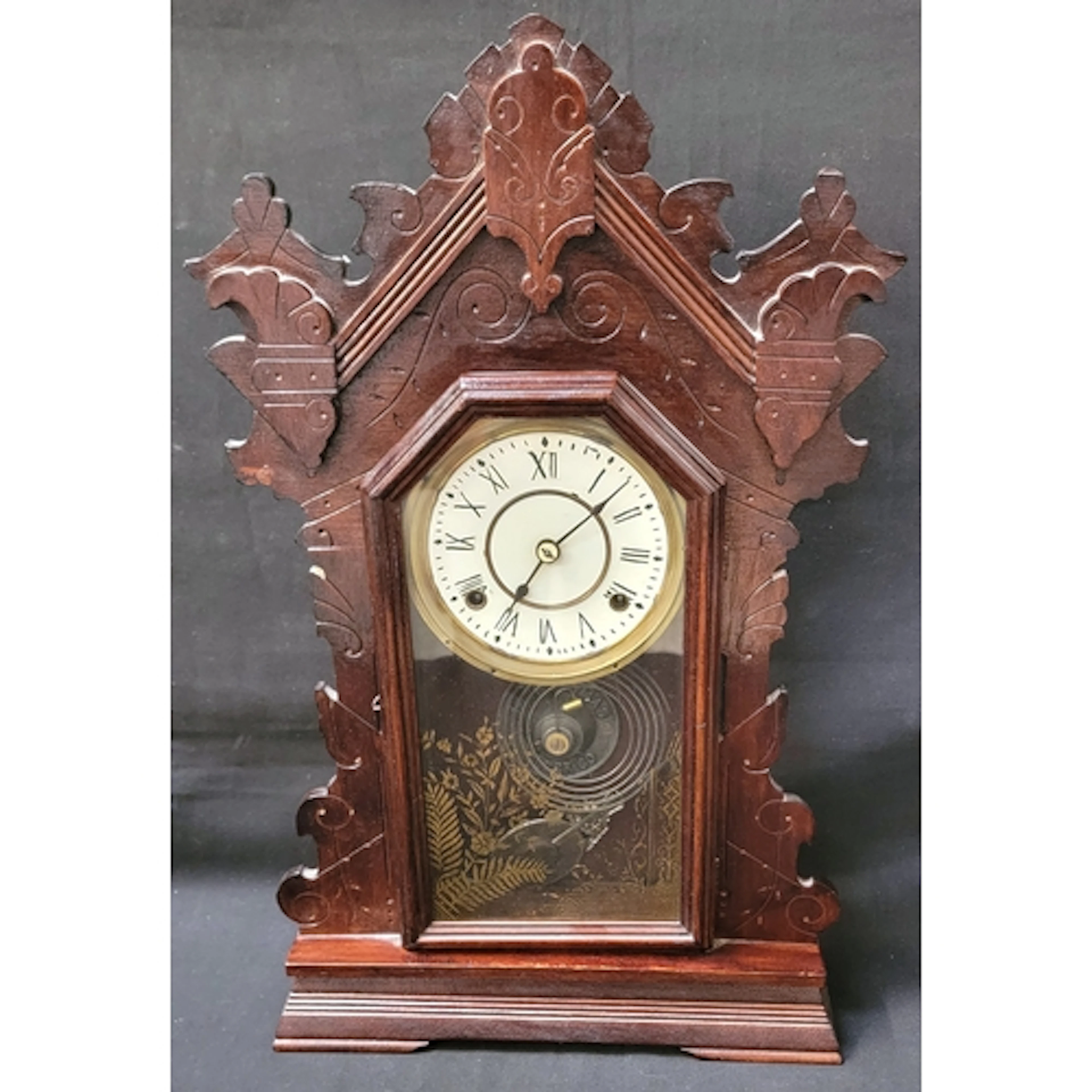 SETH THOMAS GINGERBREAD CLOCK with intricate craved and pre...