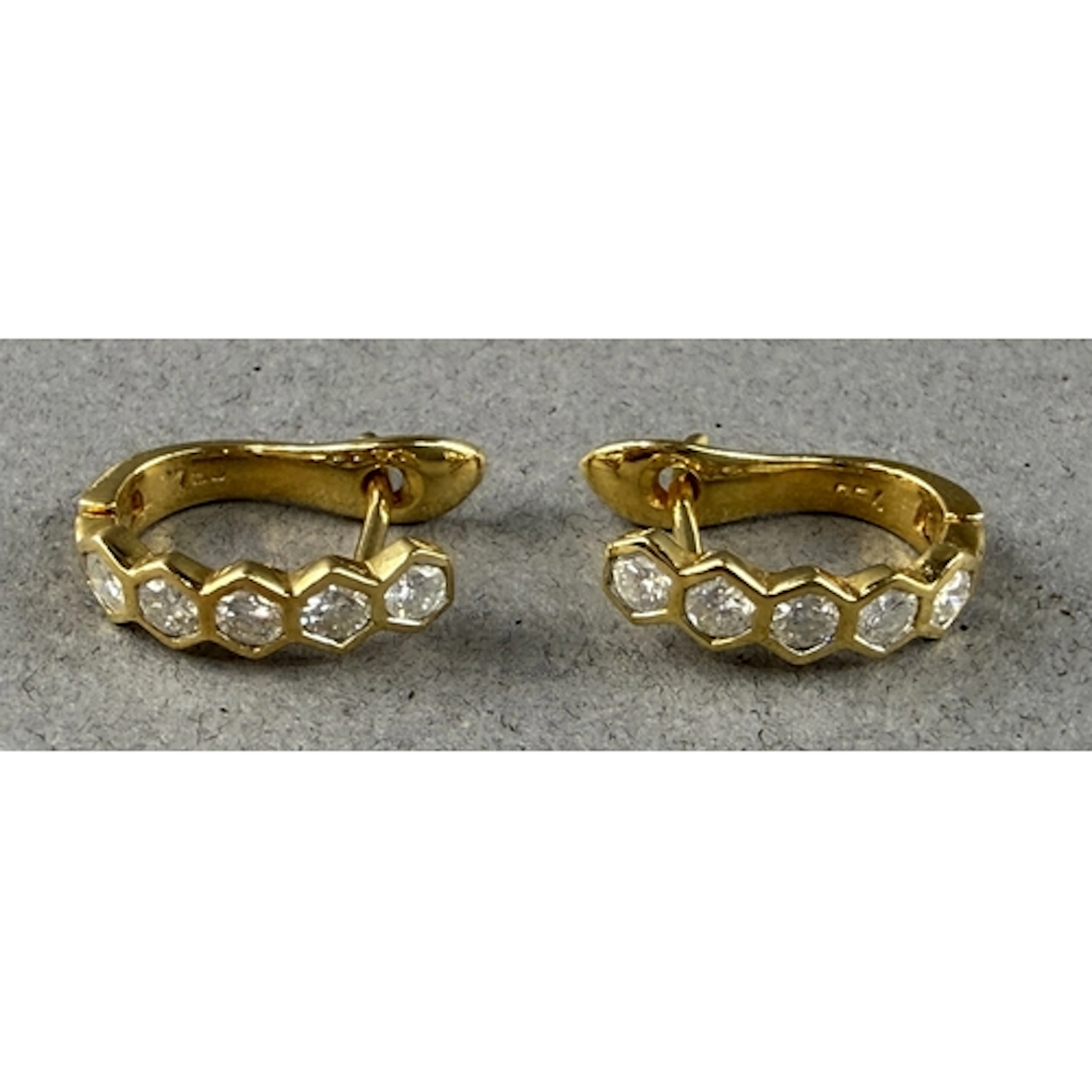 Jewellery: Pair of yellow metal hoop earrings each set with ...