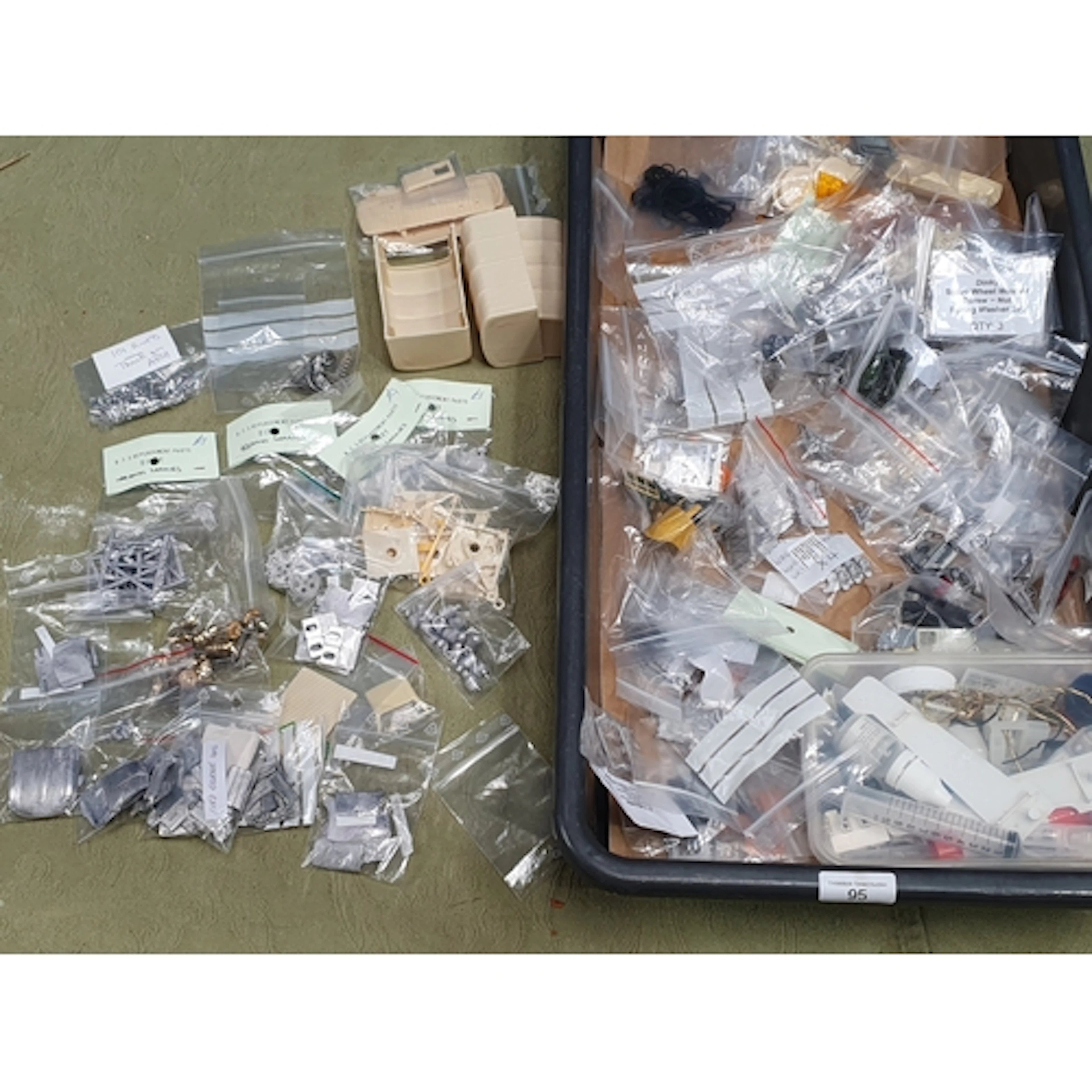 A box of diecast Dinky Toys replacement parts by B.T.S. Moul...