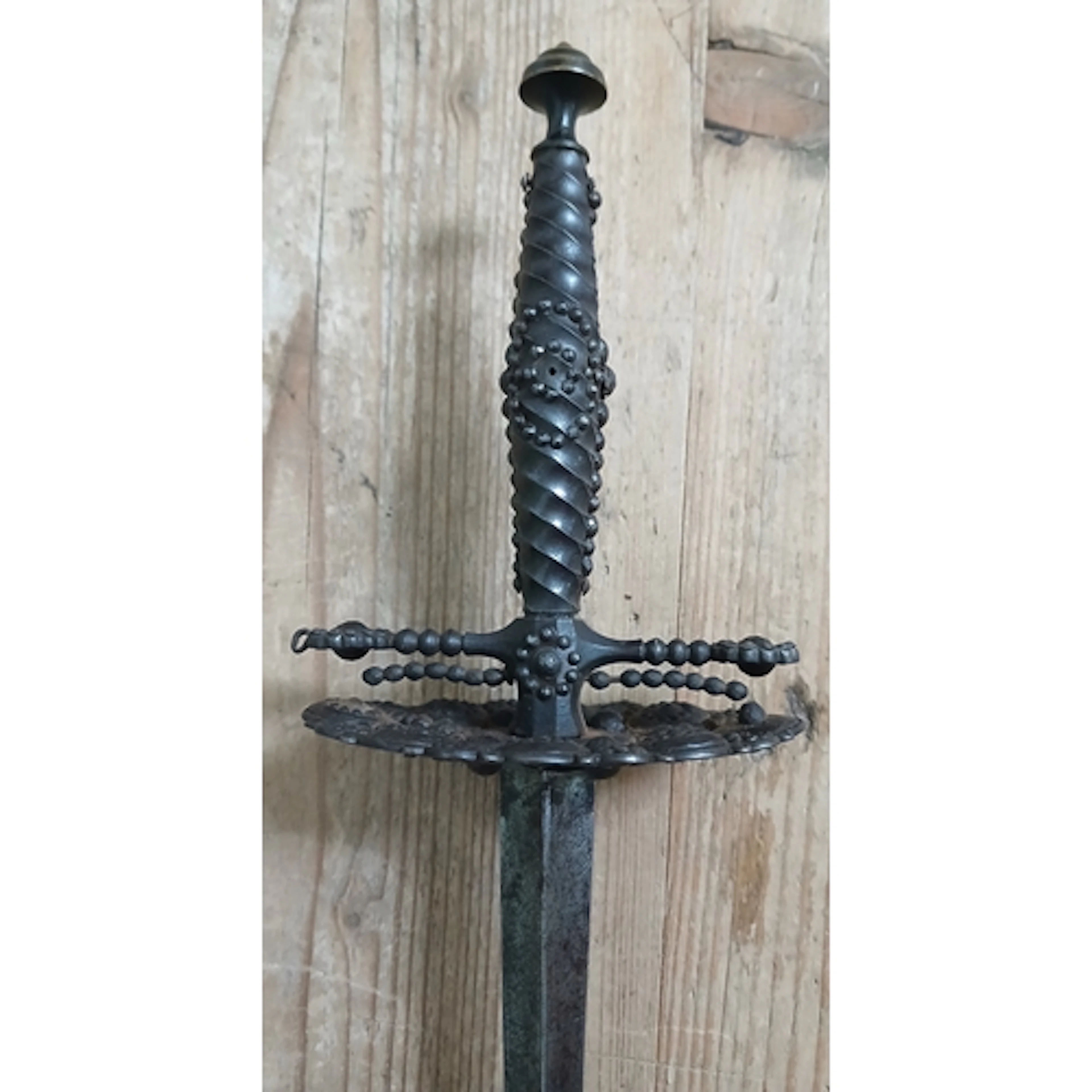 A George III English mourning sword, decorated iron hilt, et...