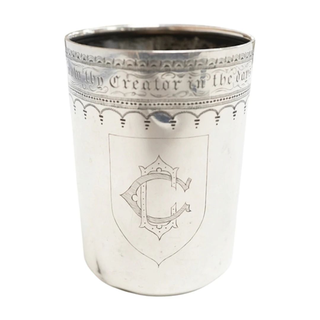 A 19th century continental white metal beaker, with engraved...