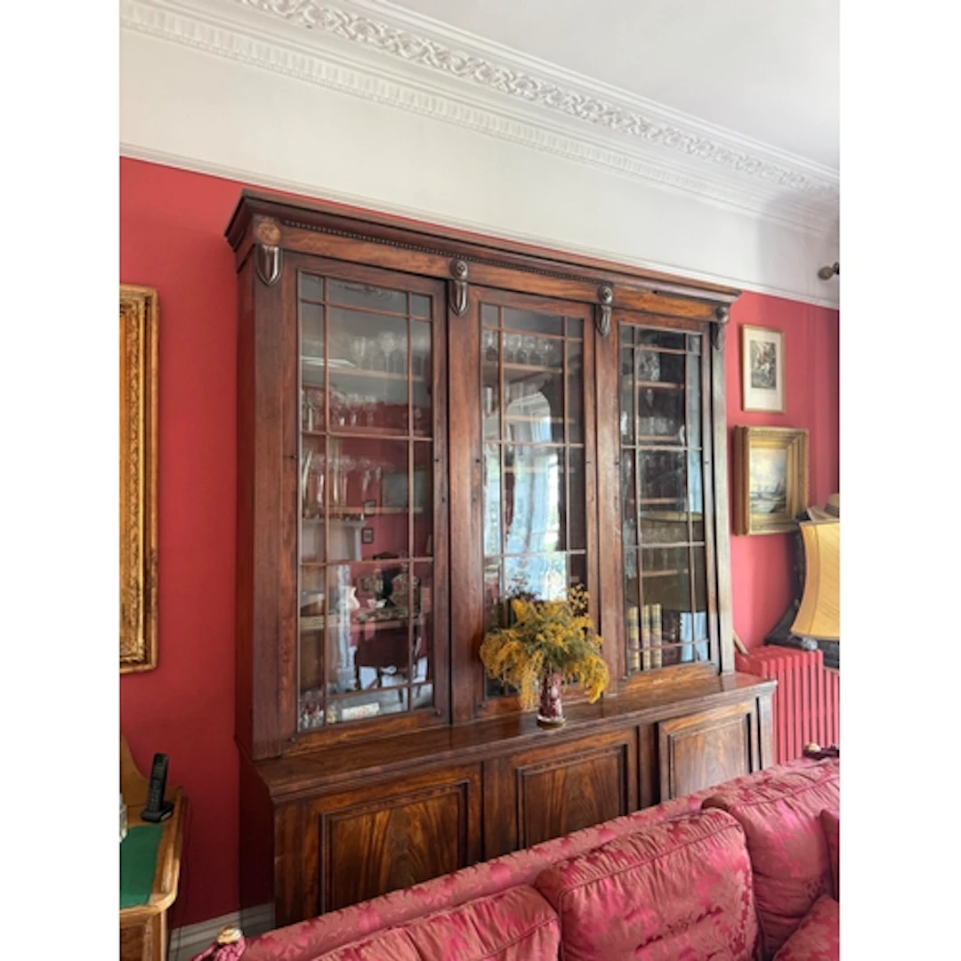 AN EARLY 19TH CENTURY MAHOGANY BREAKFRONT LIBRARY BOOKCASE 2...