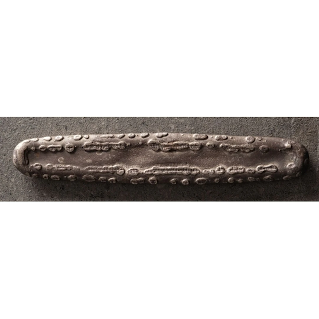 A piece of Far Eastern 'Canoe Money'. 86g gross.