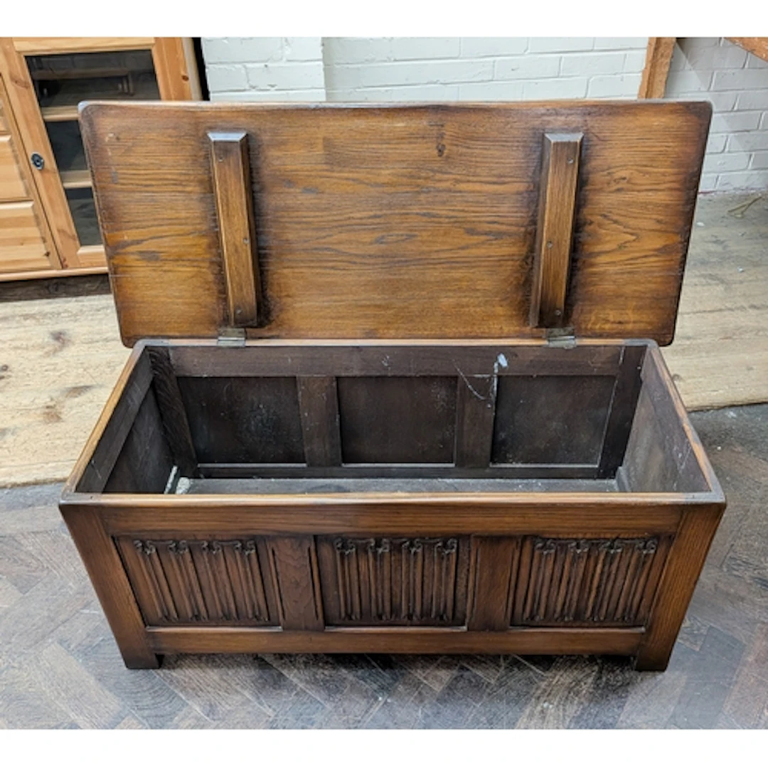 Oak linenfold carved three panel coffer