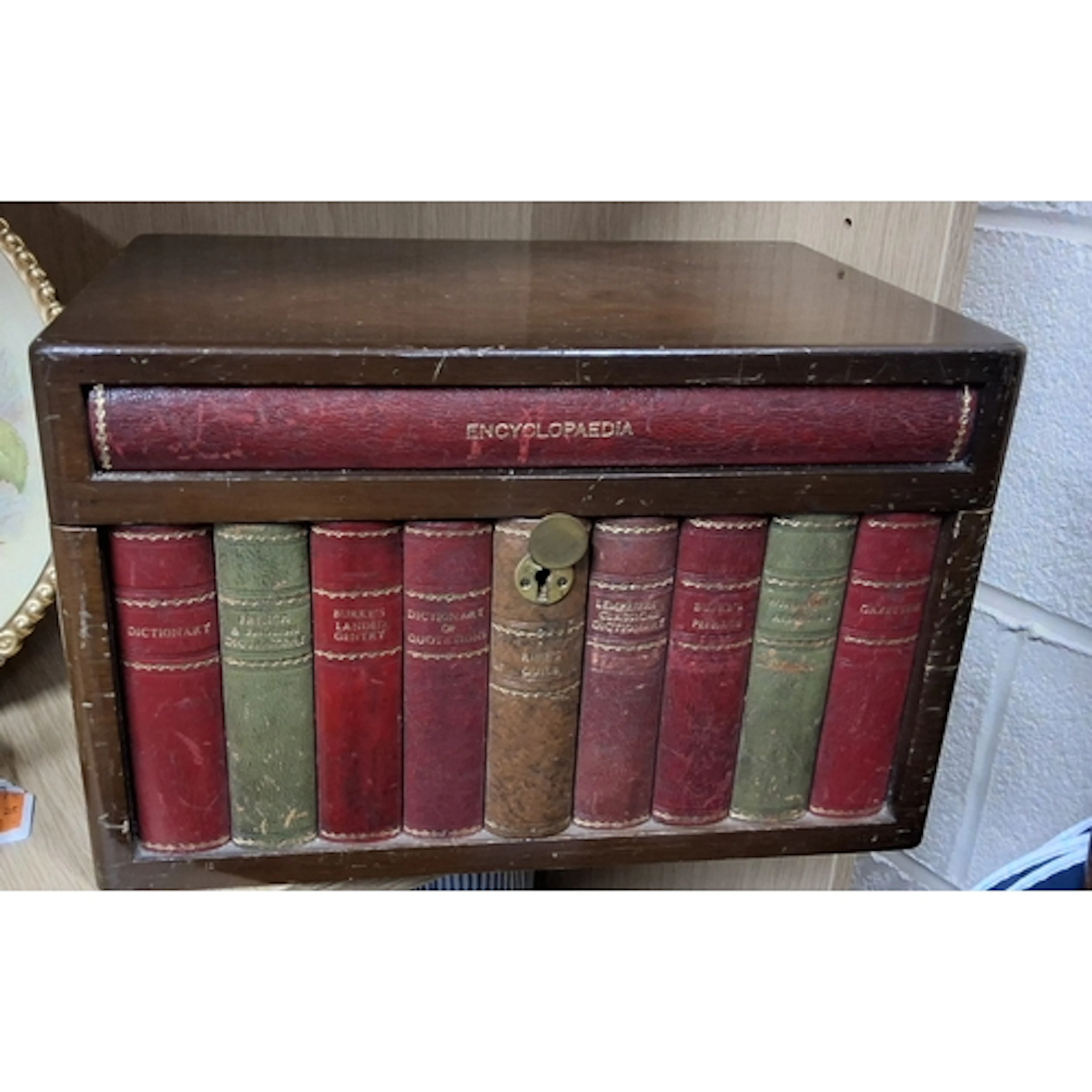 A MID 20TH CENTURY NOVELTY FAUX BOOK CIGAR HUMIDOR, featurin...