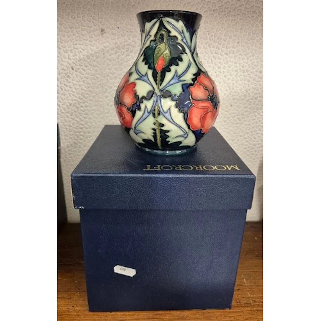 Moorcroft bulbous vase, red poppy on dark blue ground, desig...