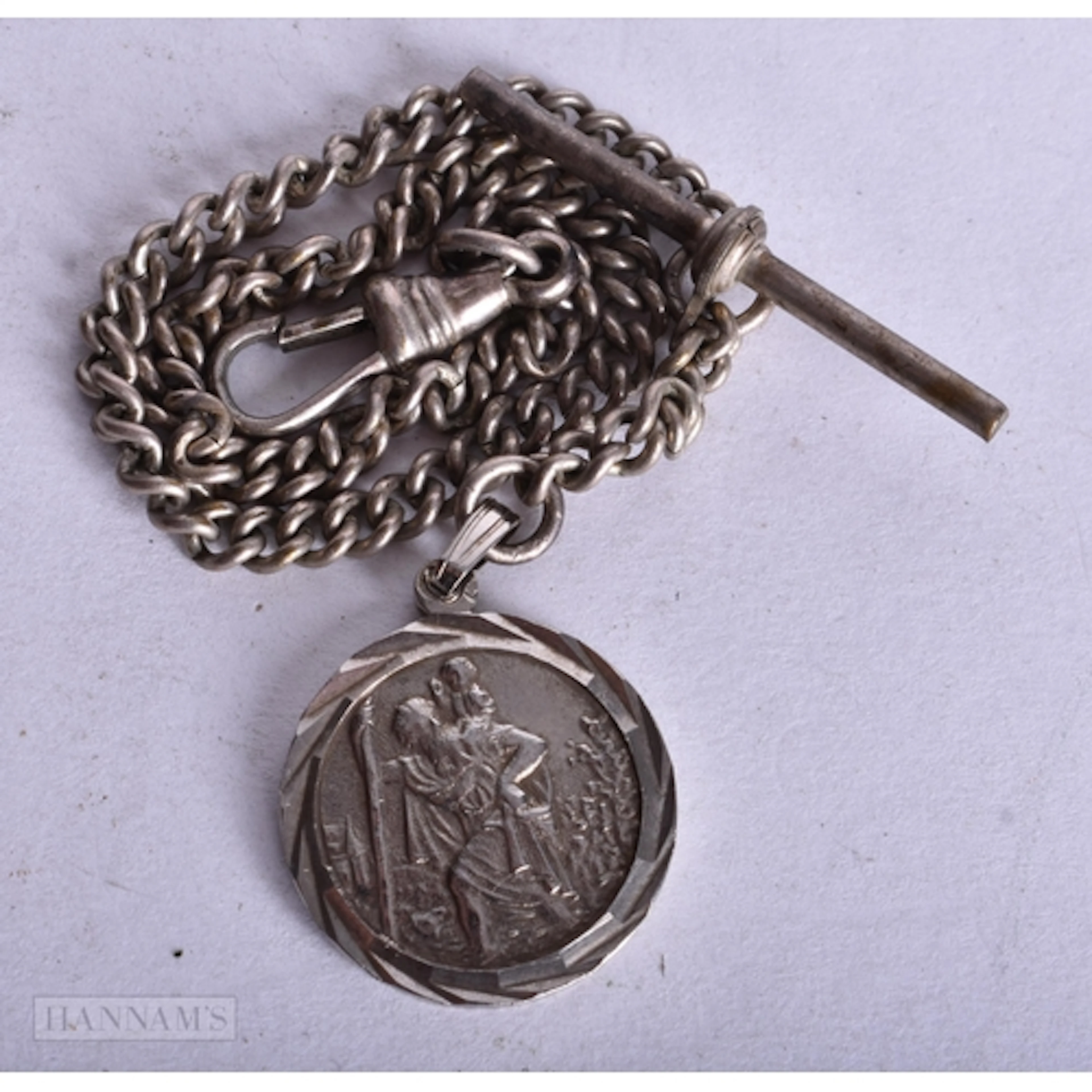 AN ANTIQUE SAINT CHRISTOPHER WATCH CHAIN. 27 cm long.