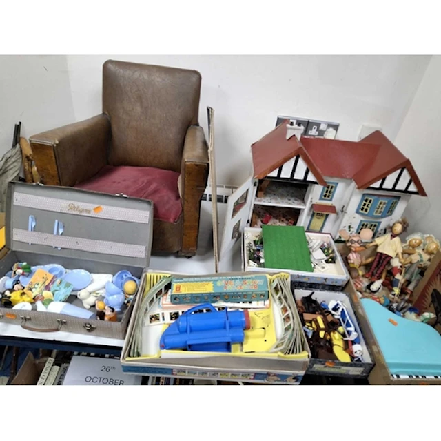 FOUR BOXES AND LOOSE TOYS, to include a vintage dolls house,...