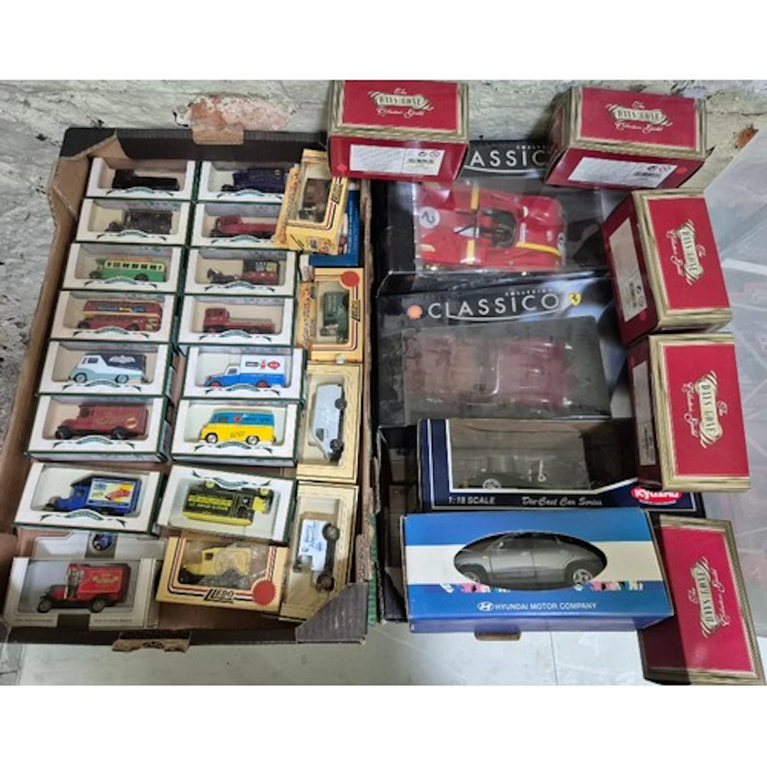 Two boxes of assorted diecast model vehicles, all boxed.
