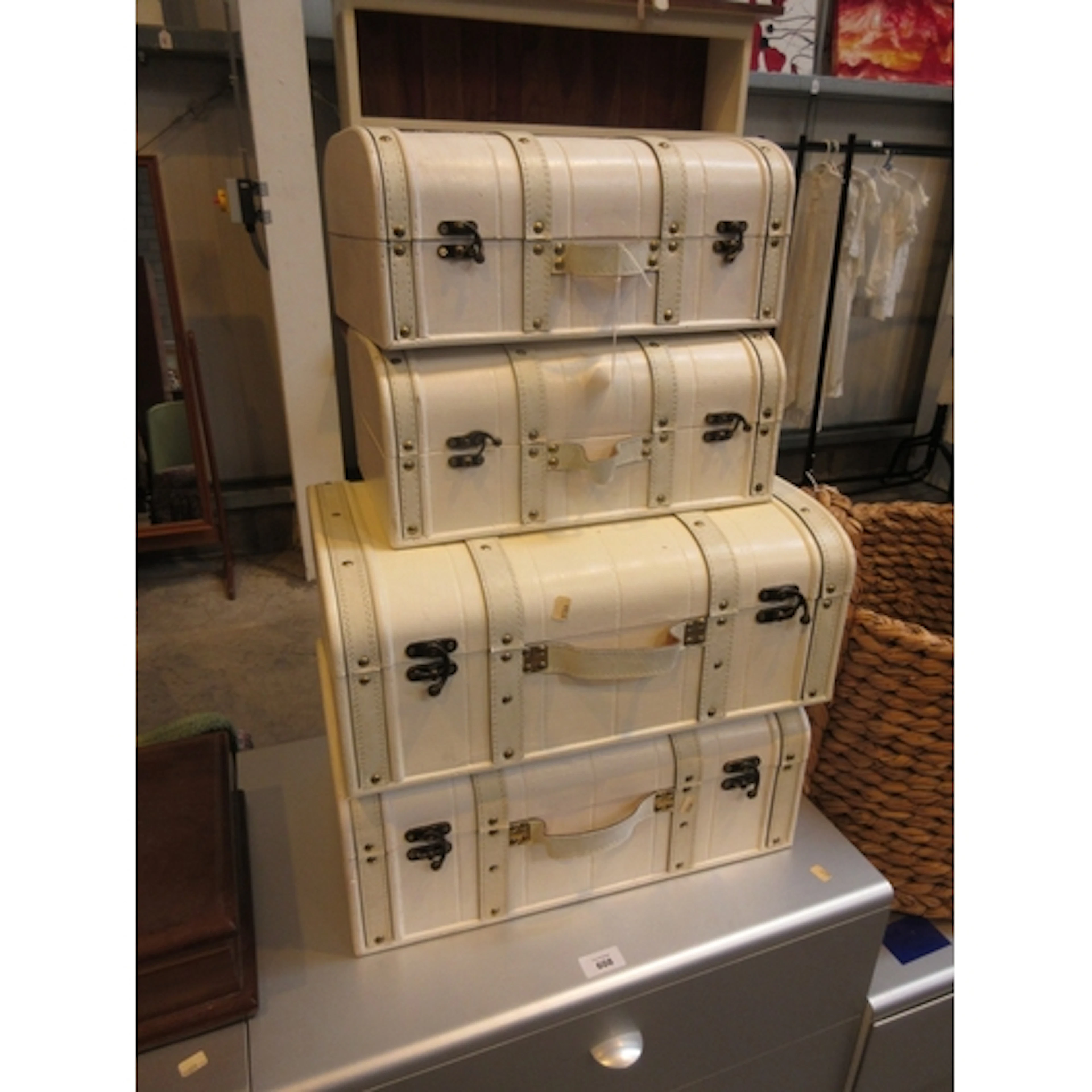 Four Ornamental Suitcases