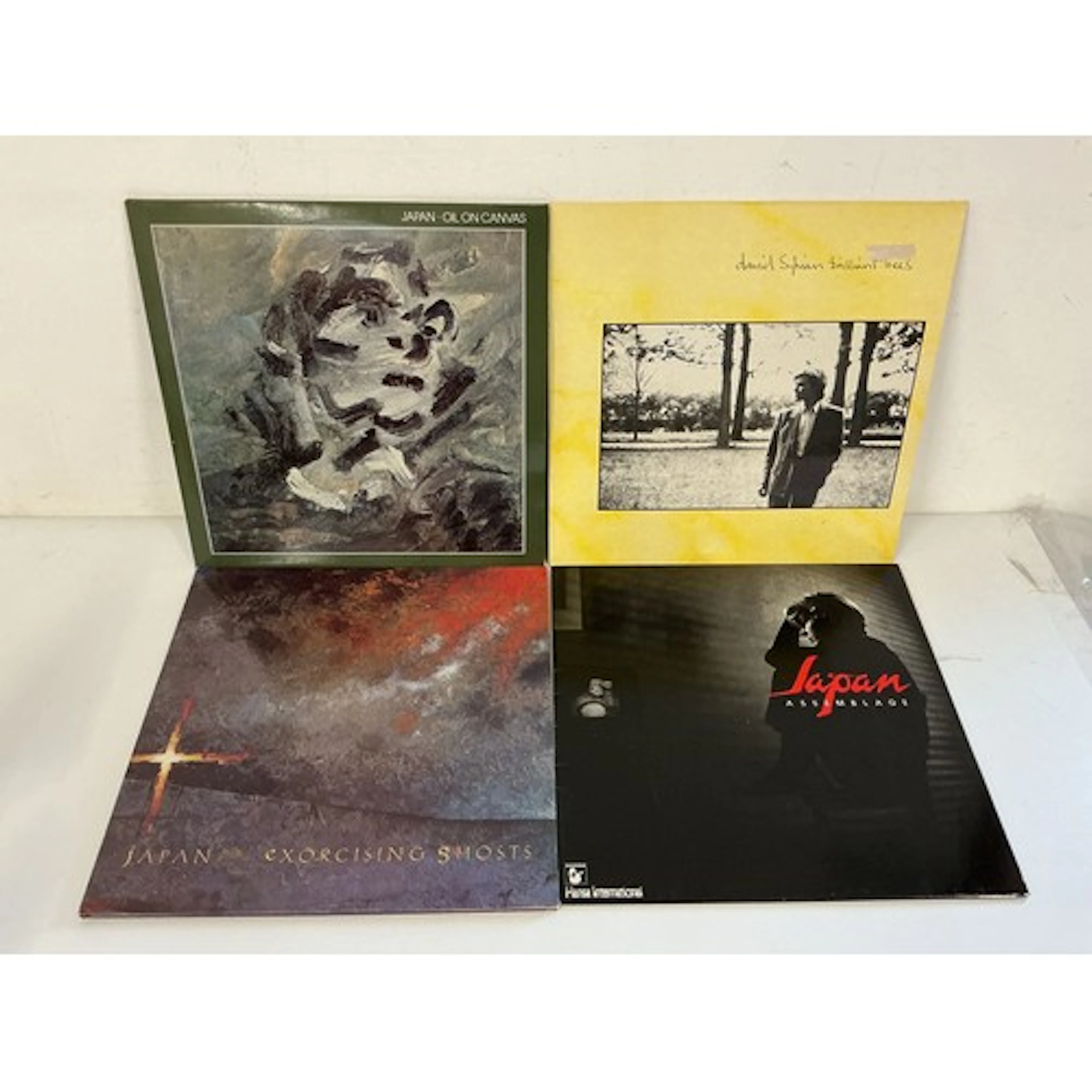 Four Japan and related LPs comprising Oil On Canvas, Exorcis...