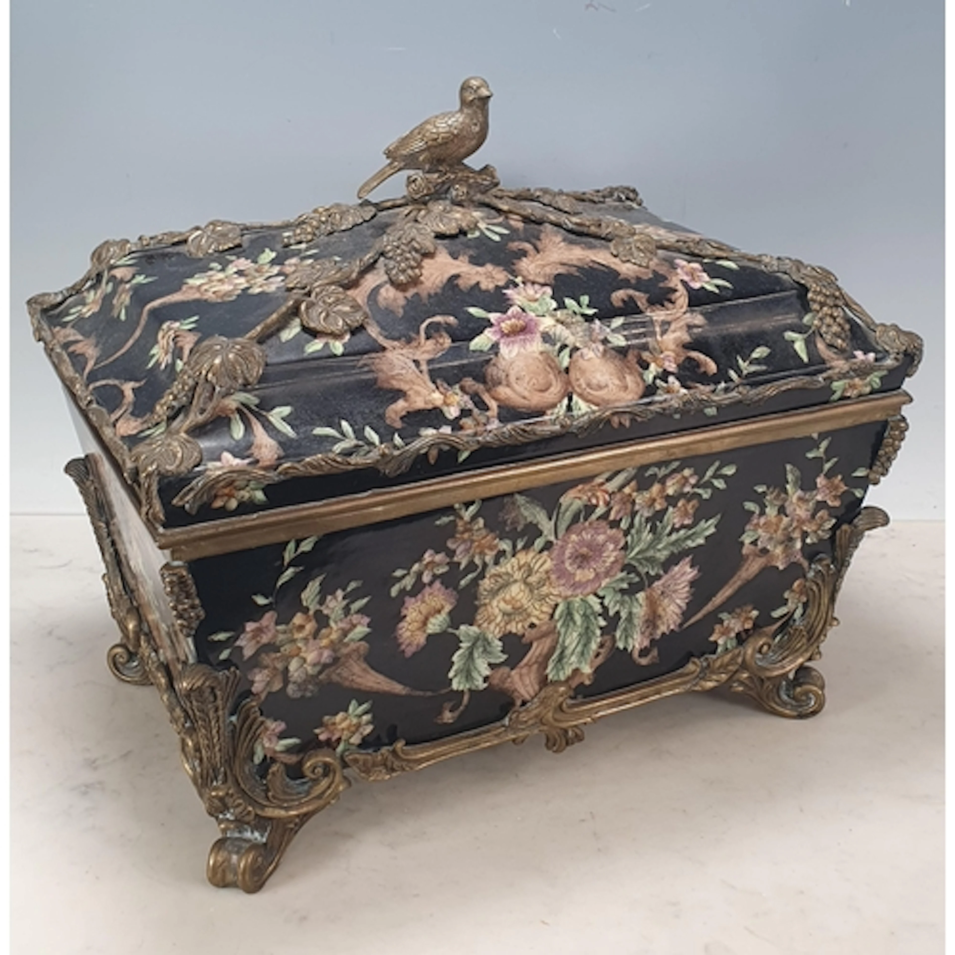 A large porcelain Table Casket, gilt metal bound with fruiti...