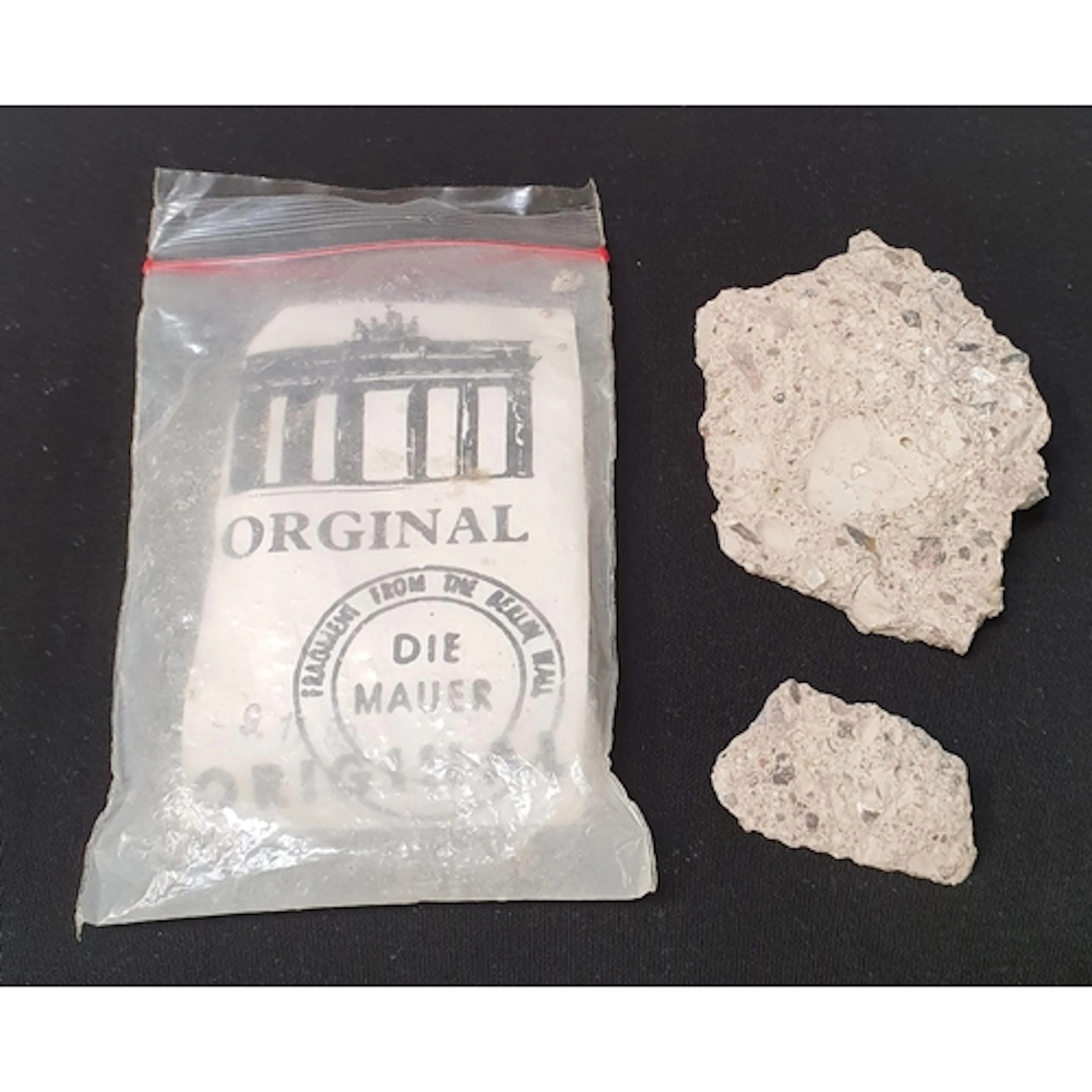 BERLIN WALL FRAGMENTS the two pieces of the Berlin Wall acco...