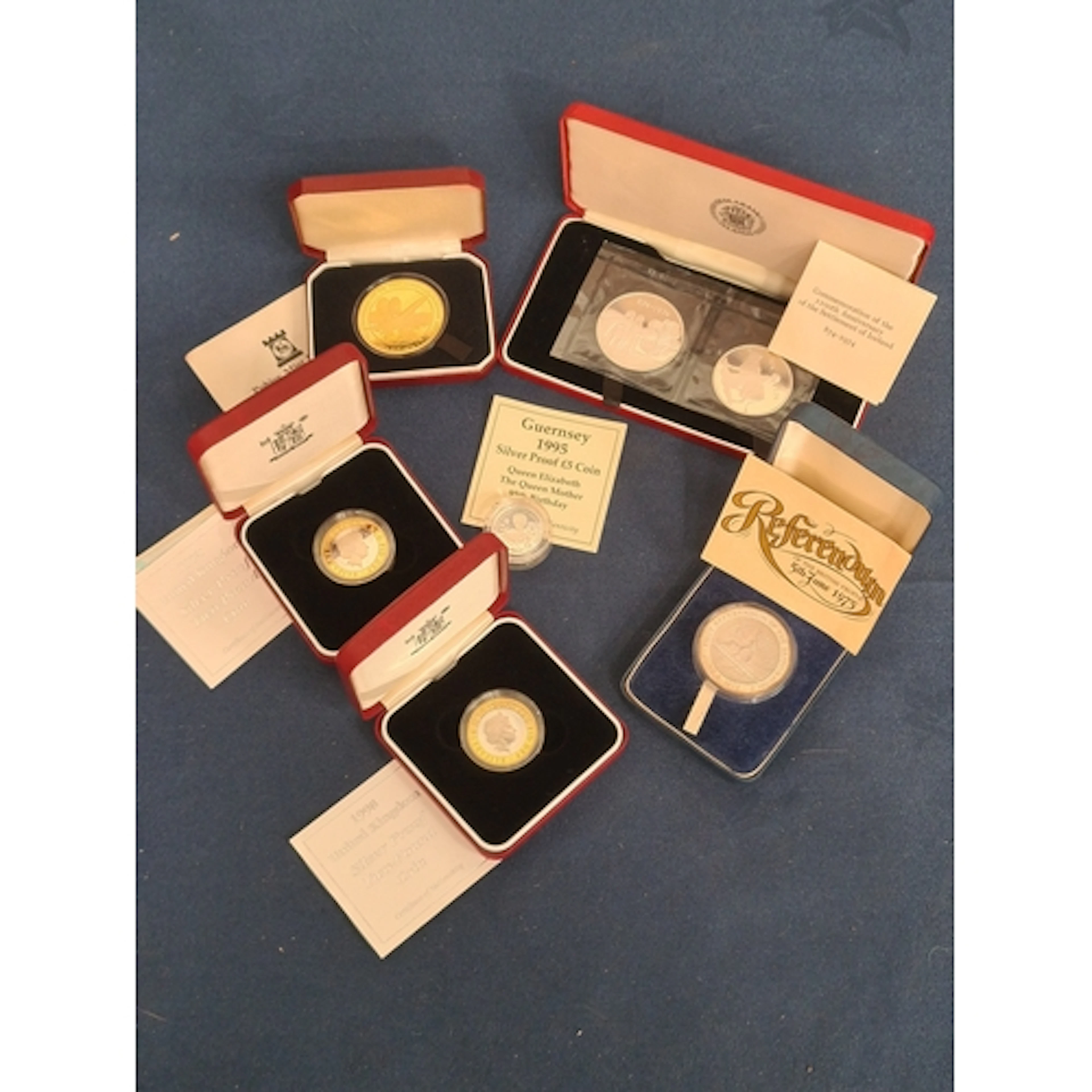 A collection of silver proof Coins and Medallions consisting...