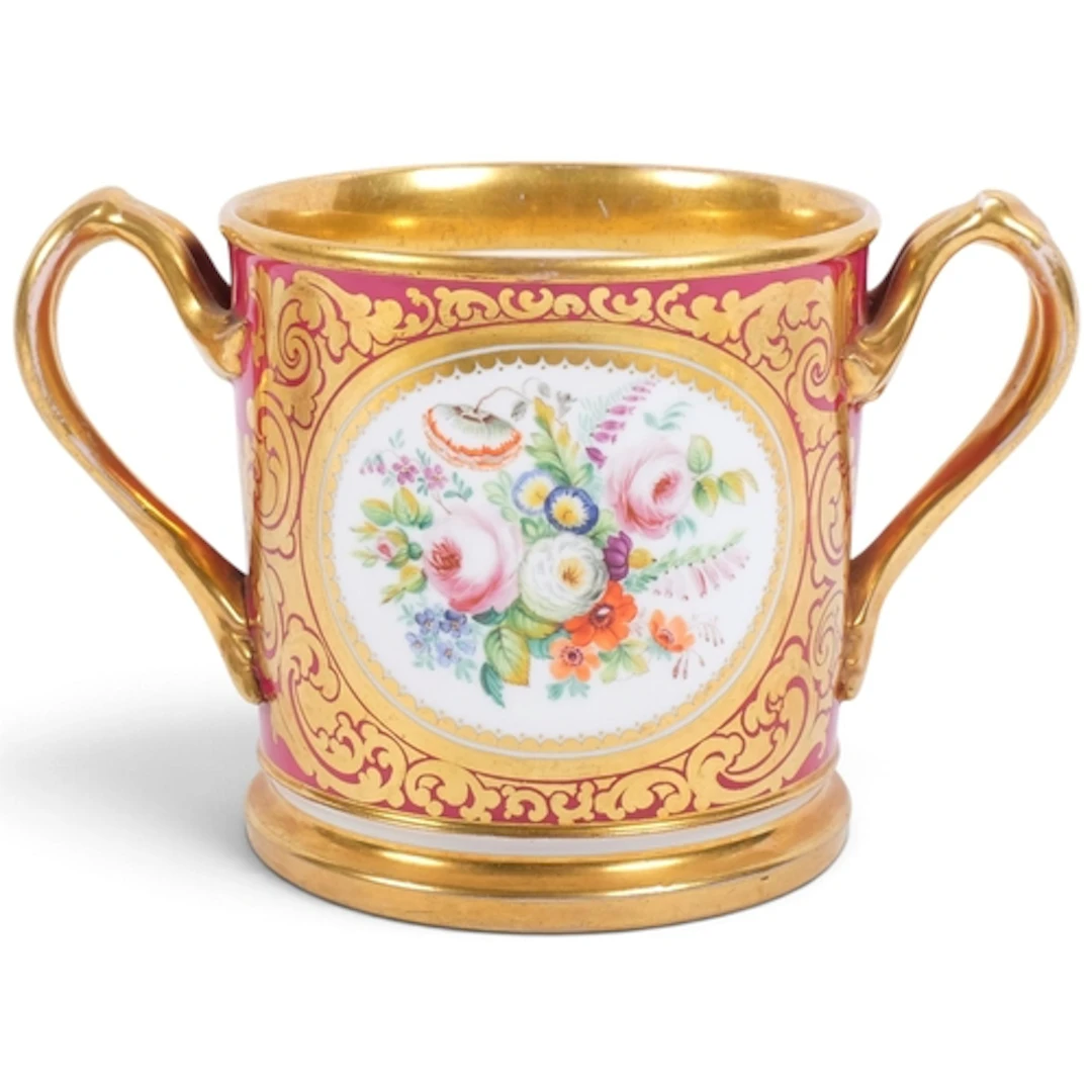 A large Antique Staffordshire loving cup, hand-painted flora...