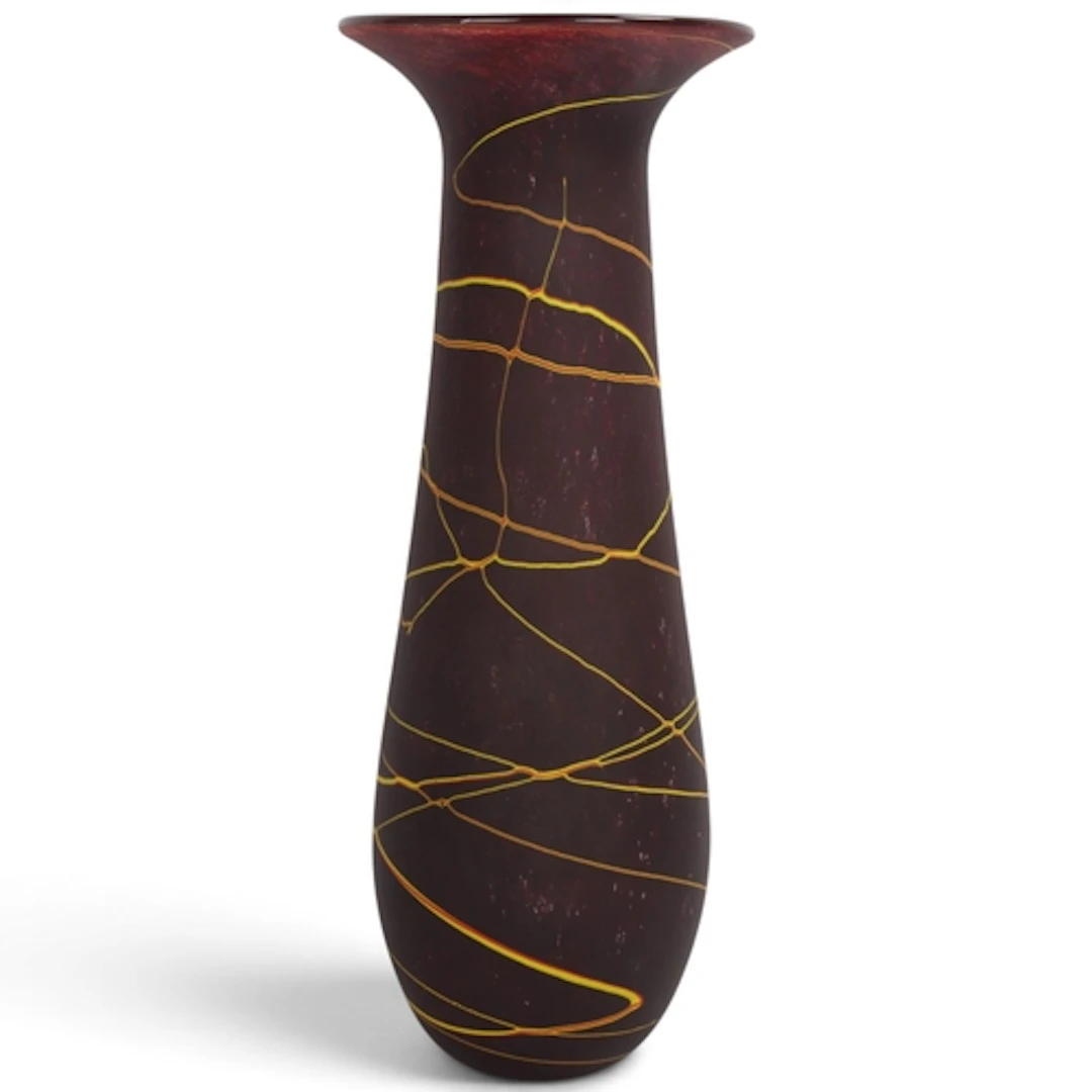 WILL SHAKSPEARE glass works, a tall mottled burgundy glass v...