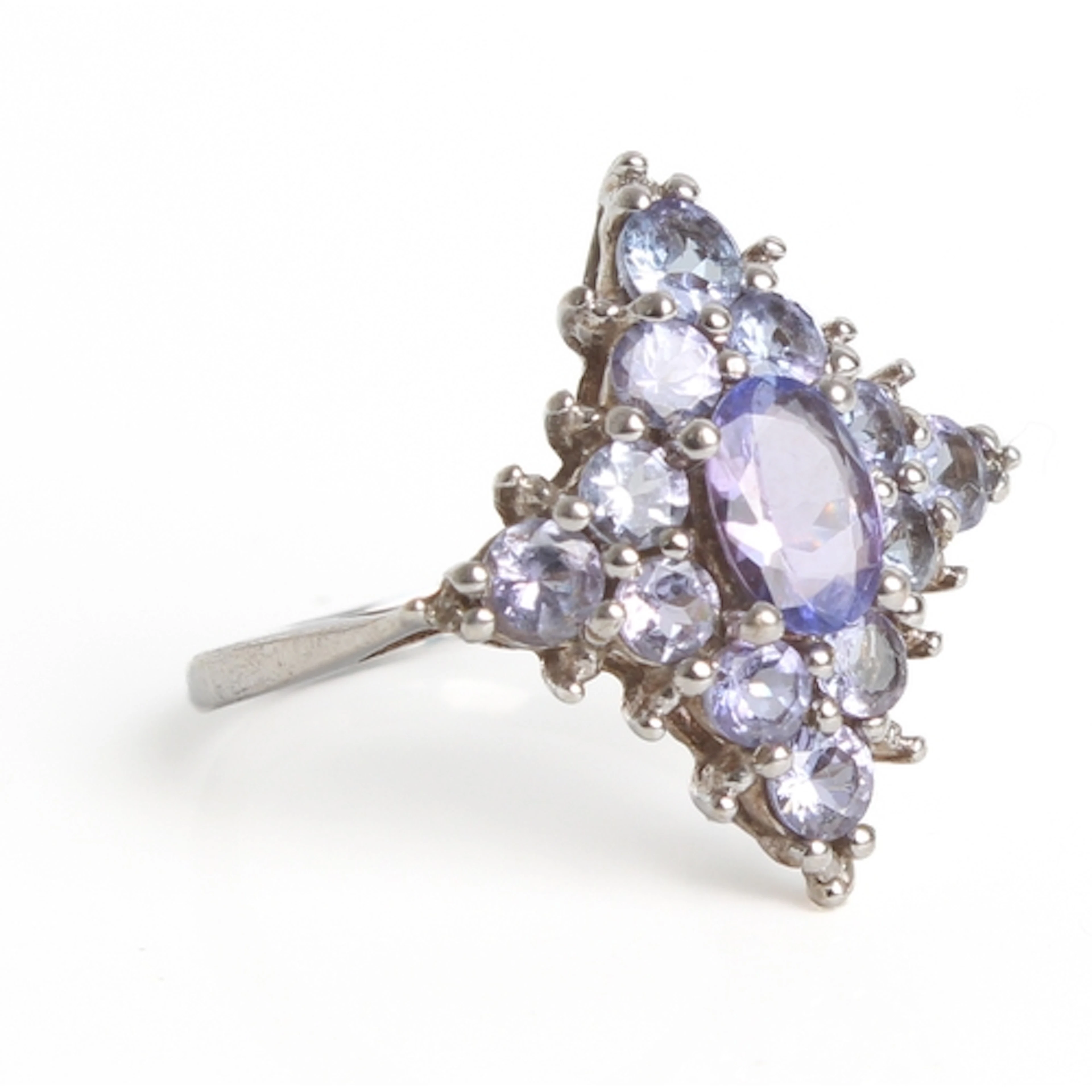 A 9ct white gold and pale Tanzanite cluster ring - Birmingha...