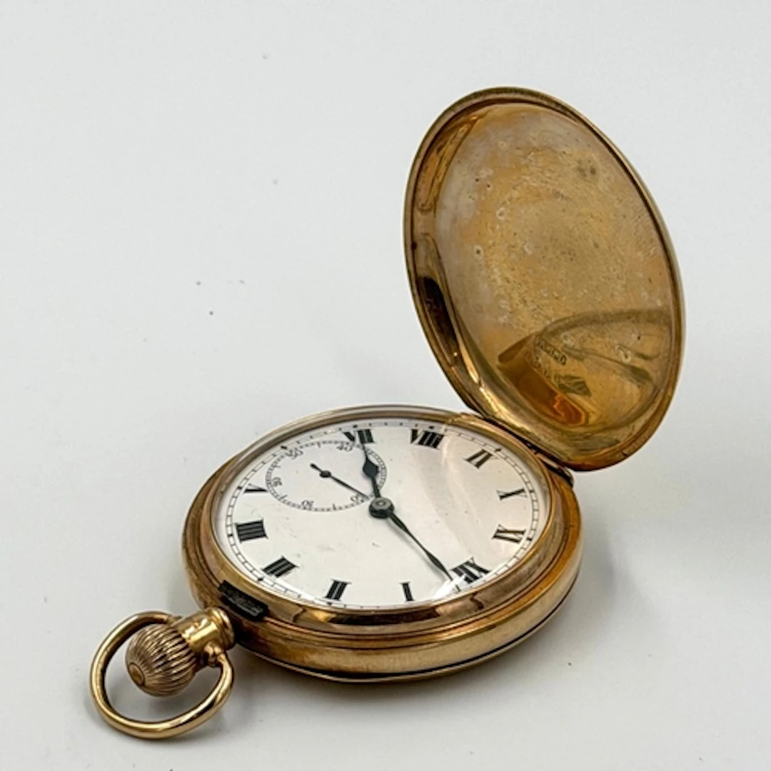 A 9ct gold hunter pocket watch, hallmarked with The Dennison...