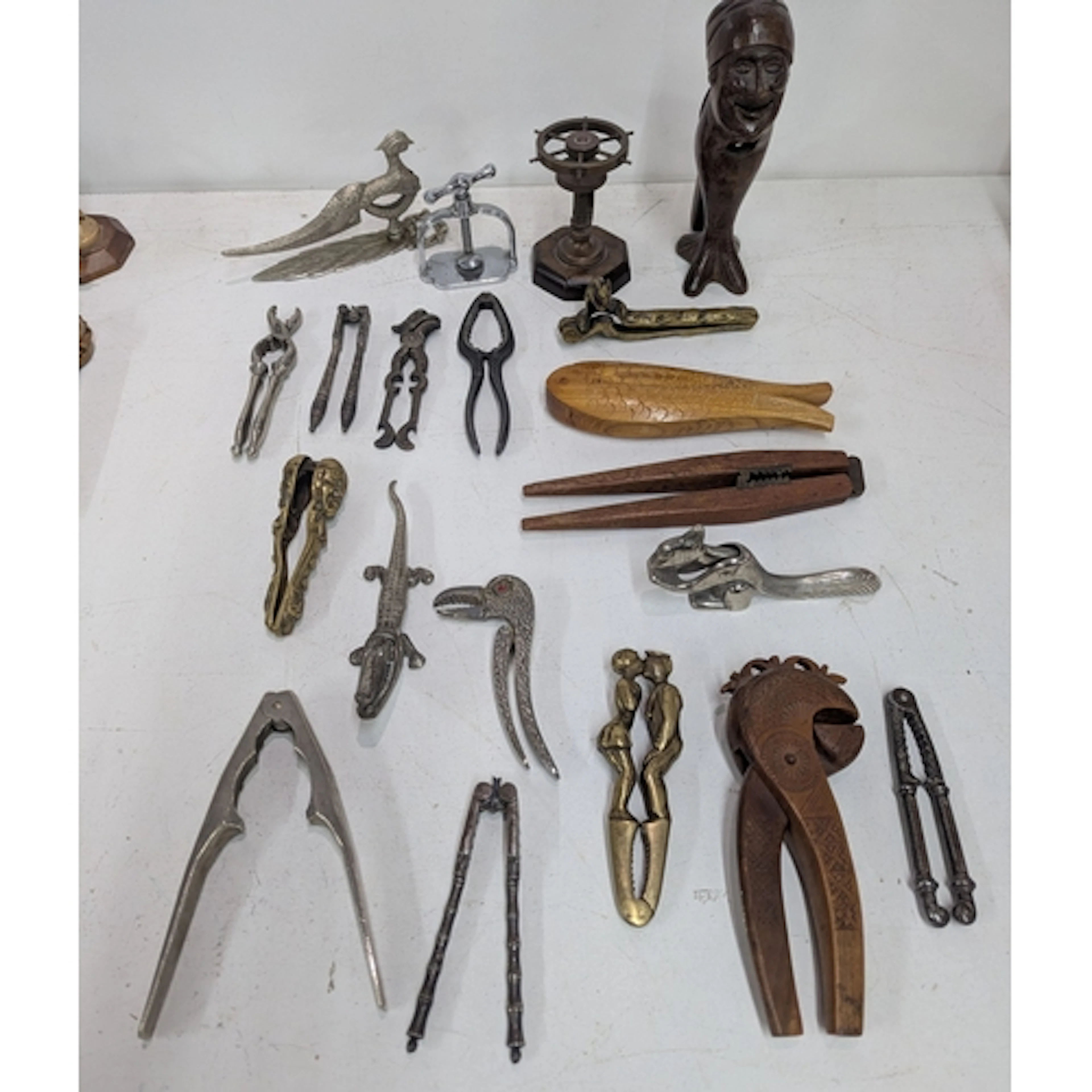 A collection of vintage nut crackers to include an example f...