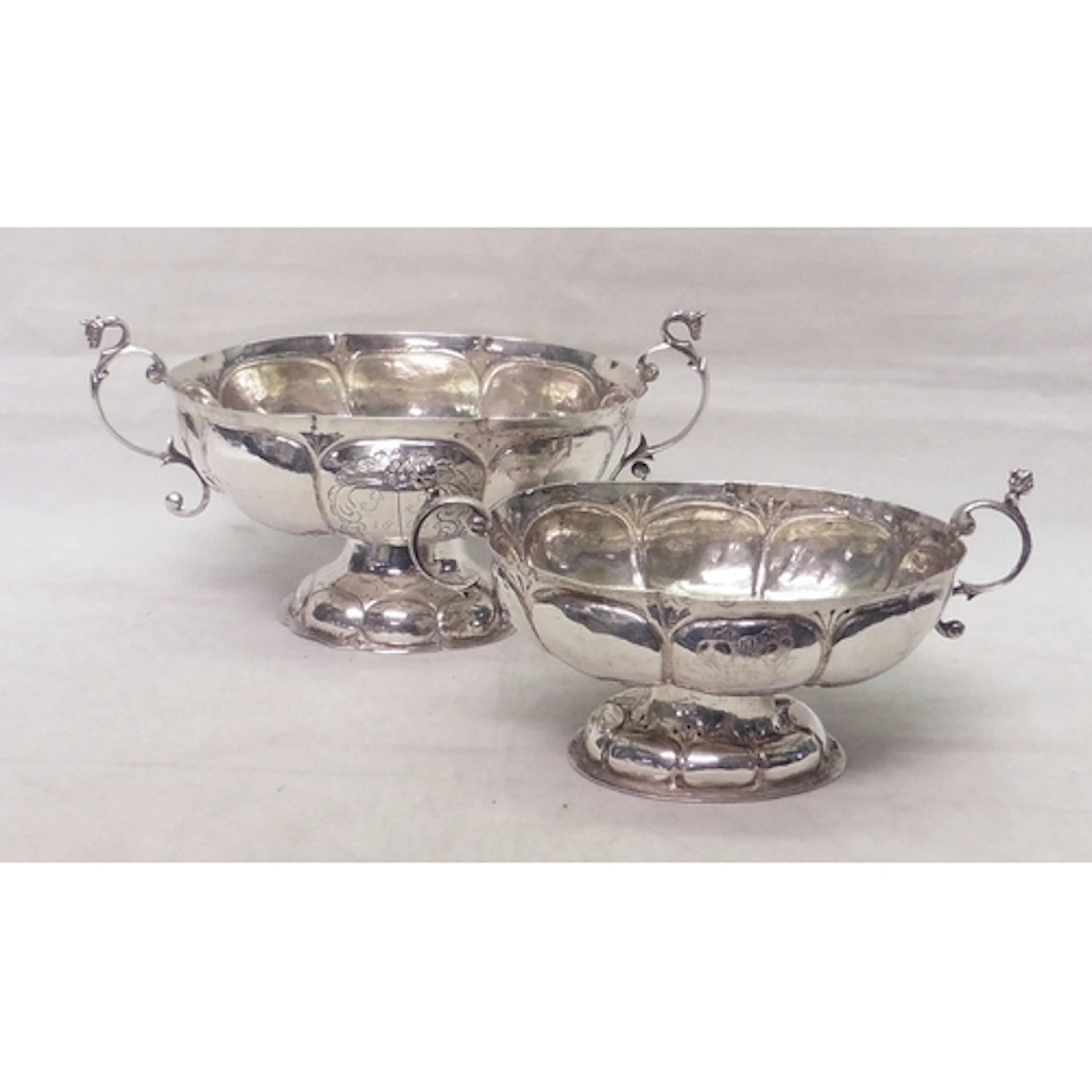 Two Dutch two-handled pedestal brandy cups engraved with ear...