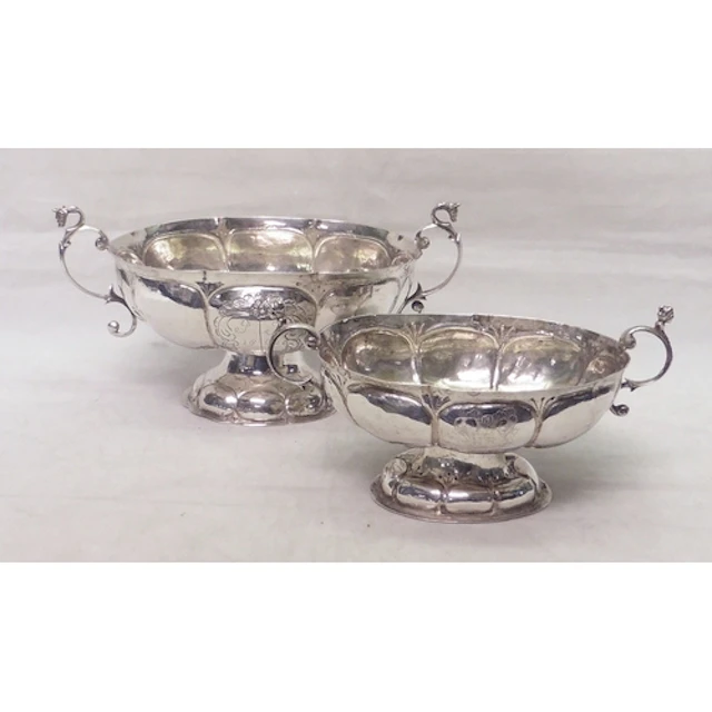 Two Dutch two-handled pedestal brandy cups engraved with ear...