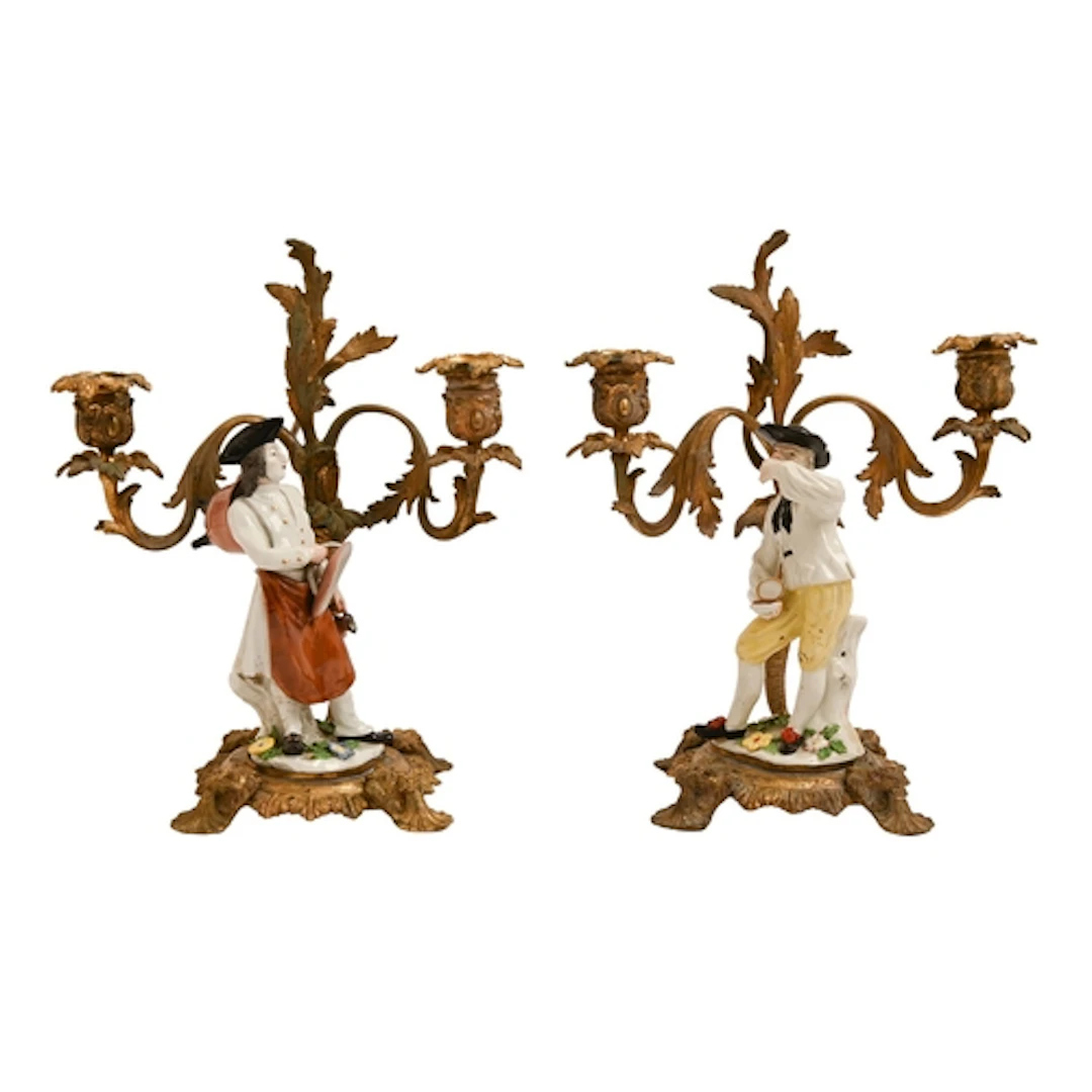 Two German porcelain figures of The Laundryman and The Snuff...