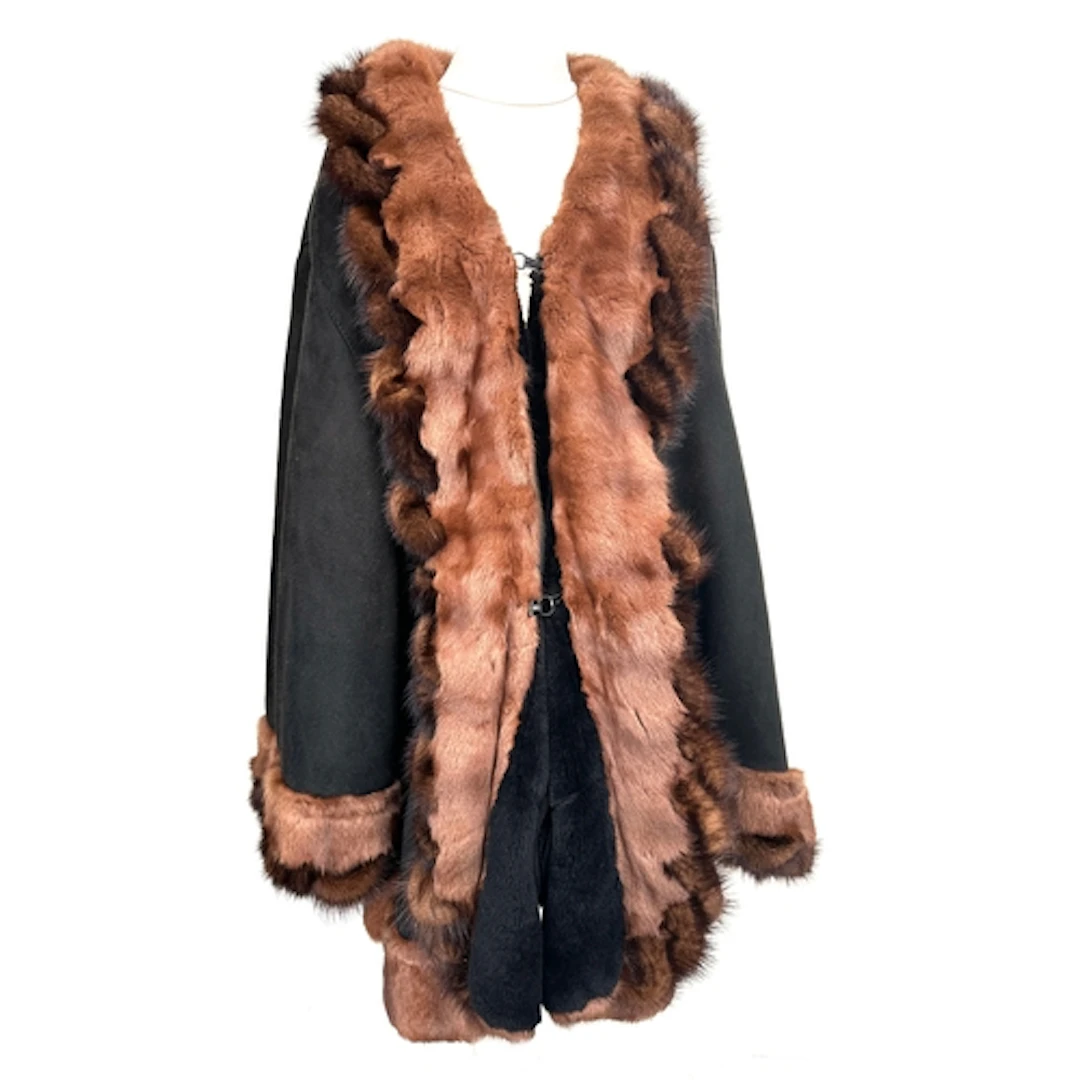 A Mabrun shearling lined sheep skin coat with fur collar and...