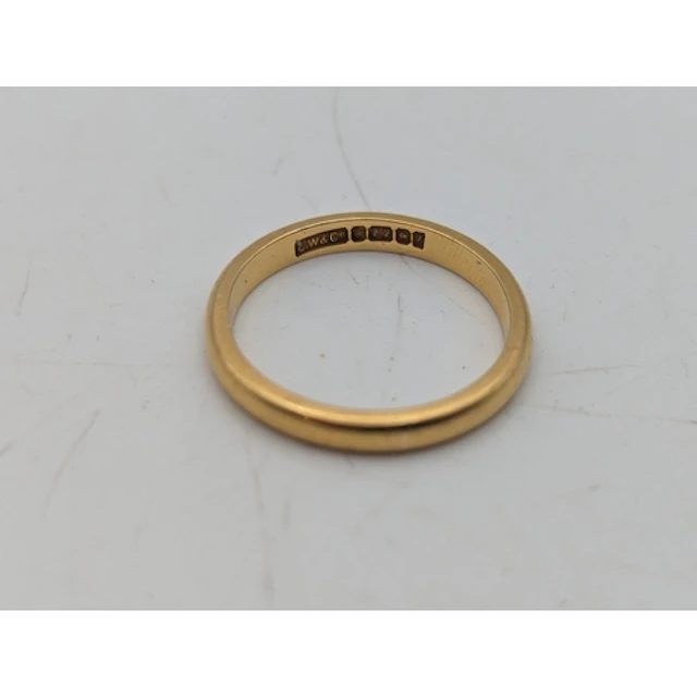 A 22ct gold wedding ring, size L1/2, 3.42g Location: If ther...