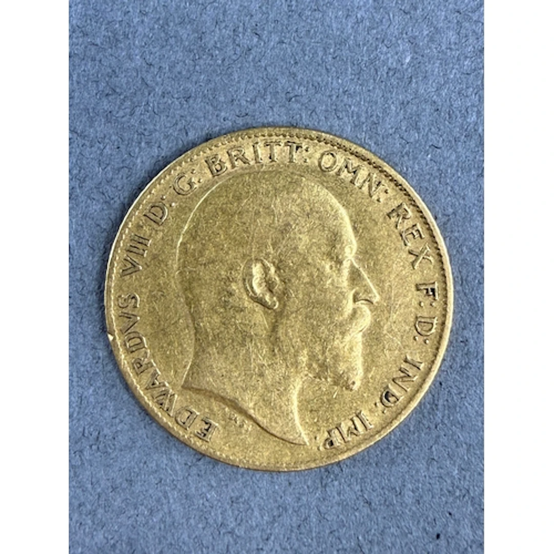 Coins: an Edward VII gold half sovereign dated 1910, circula...