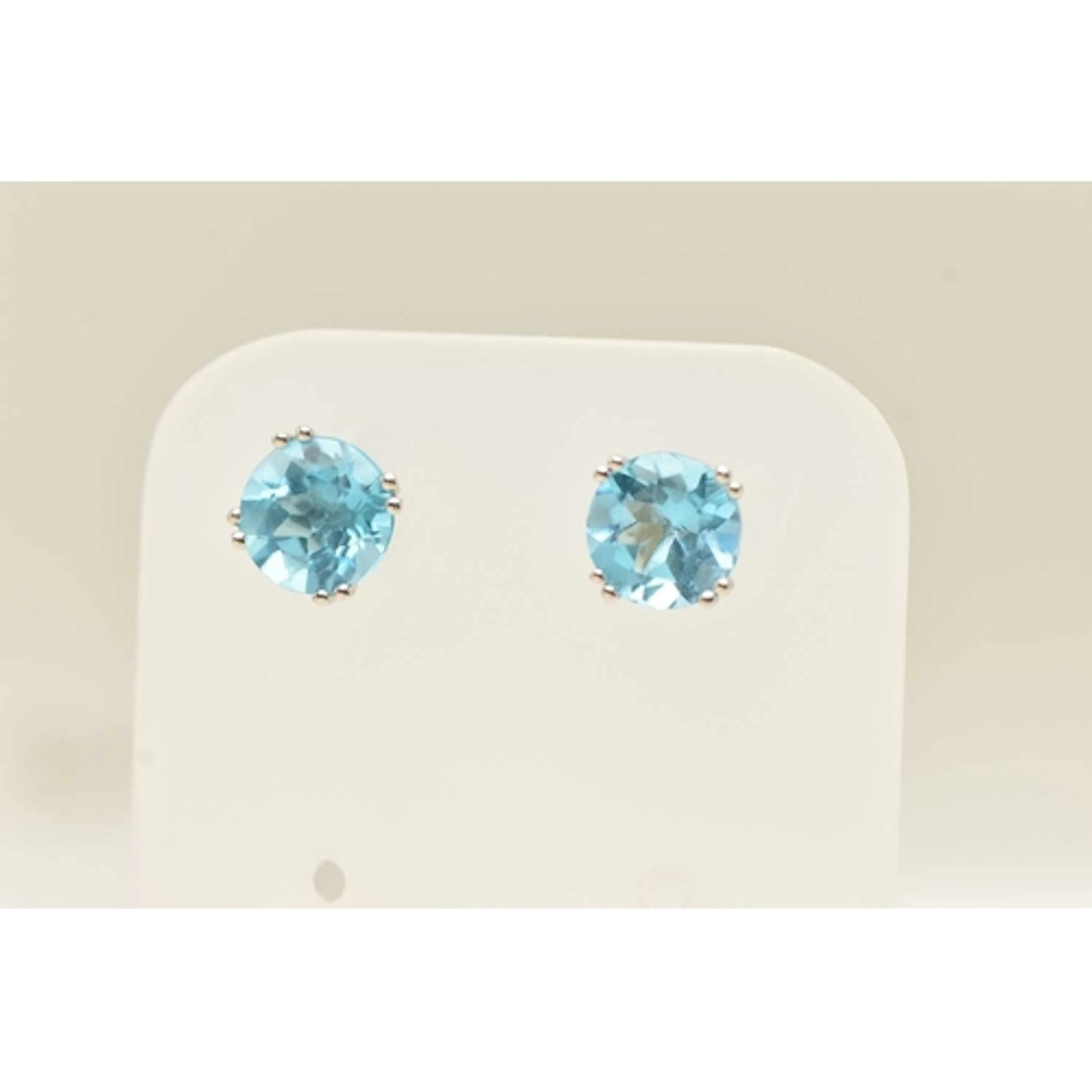 A PAIR OF WHITE METAL TOPAZ EARRINGS, large circular cut blu...