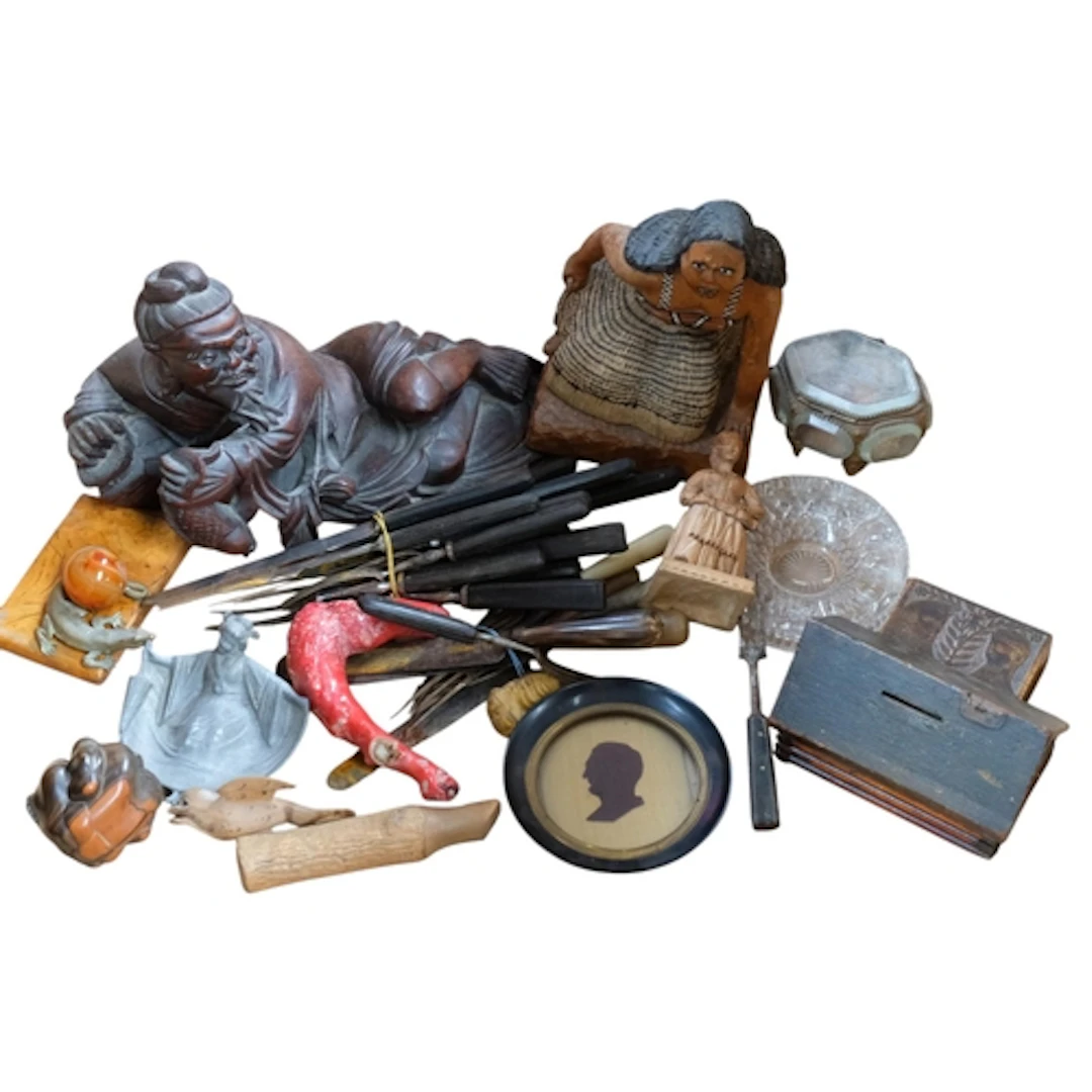 A selection of various interesting items, including a carved...