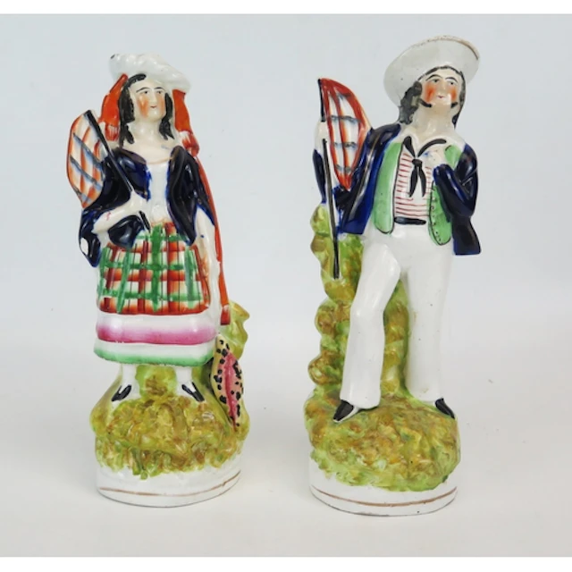 A Staffordshire figure of a Crimean sailor holding a flag, C...