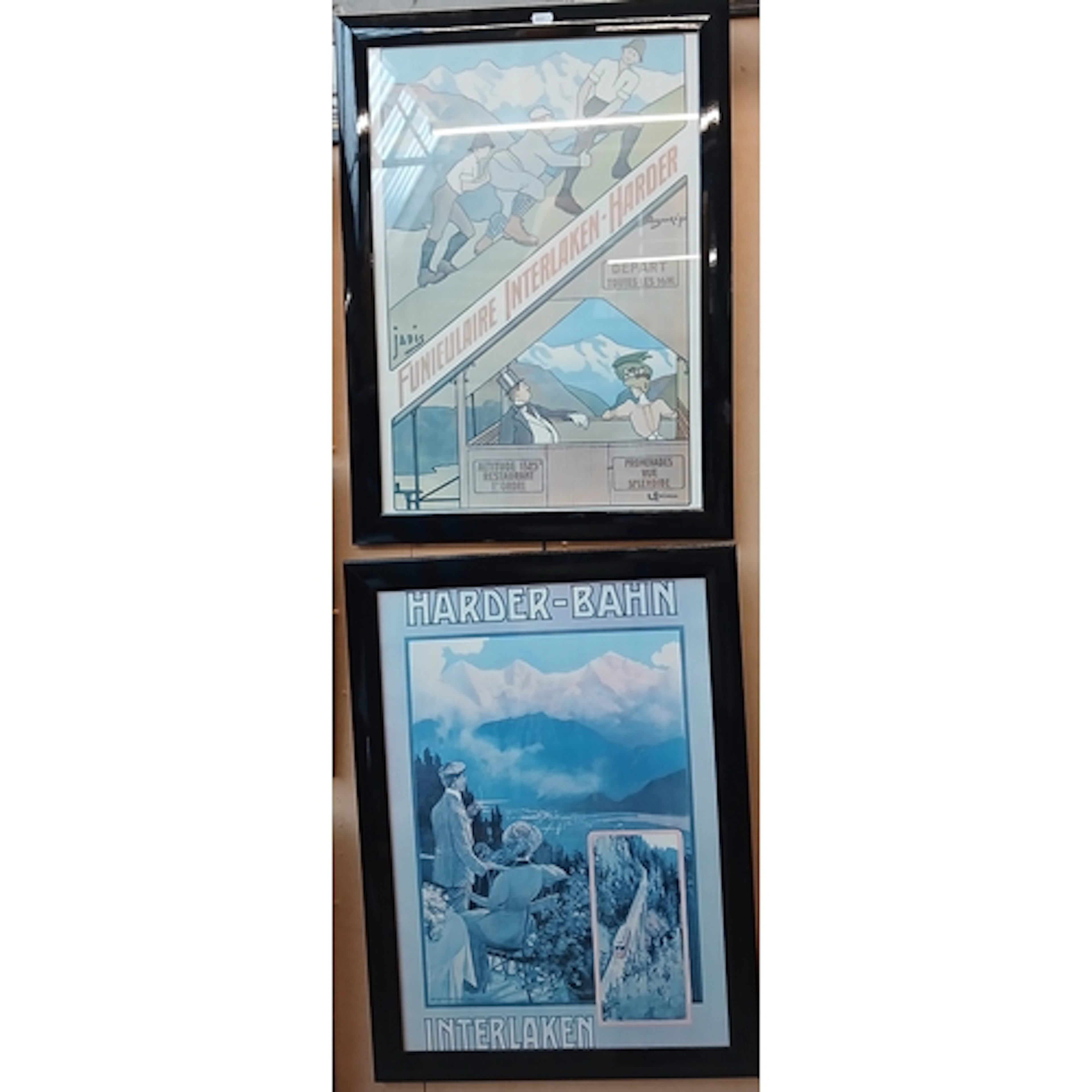 Two reproduction continental travel posters.