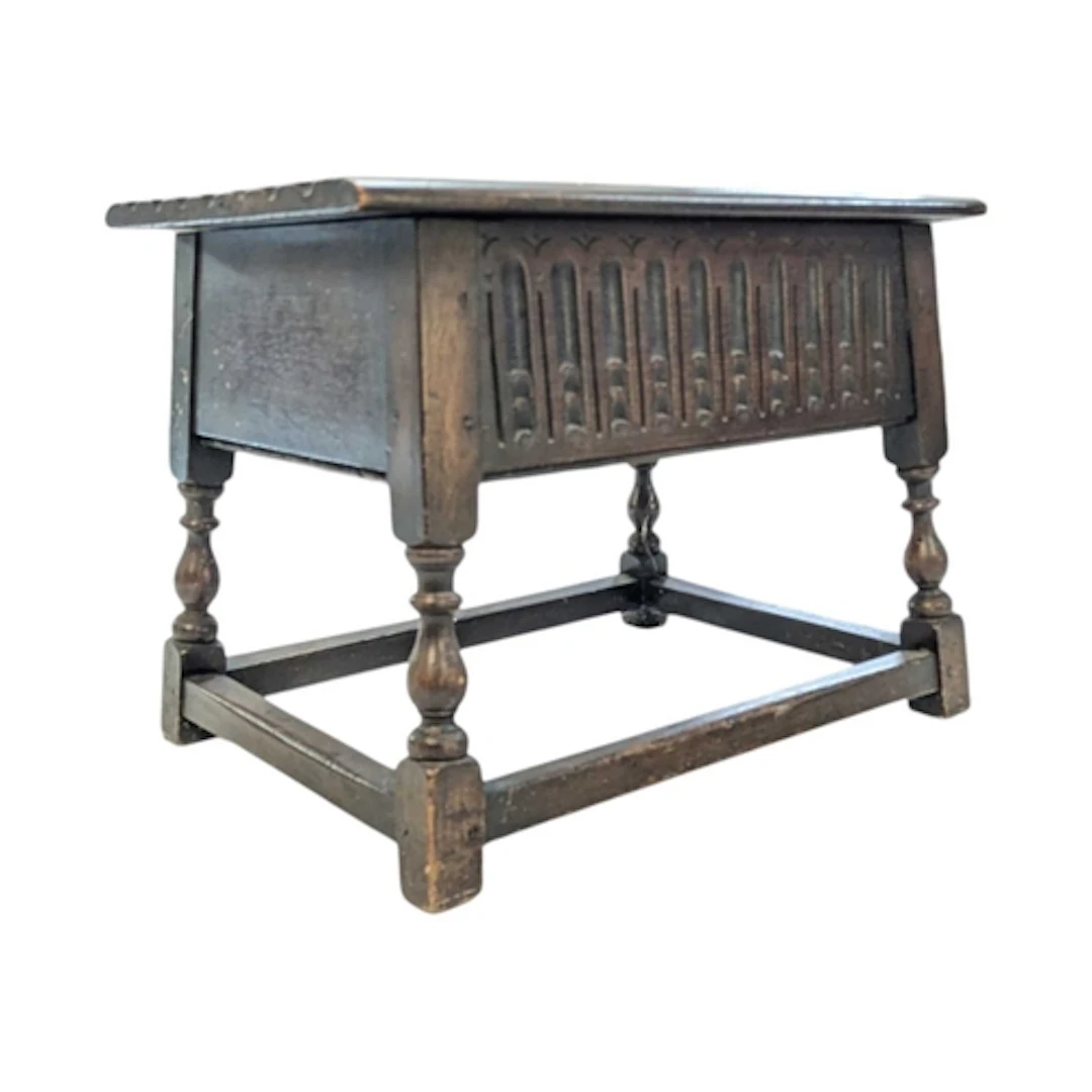 A 20th century Jacobean Revival carved oak bible box. The bi...