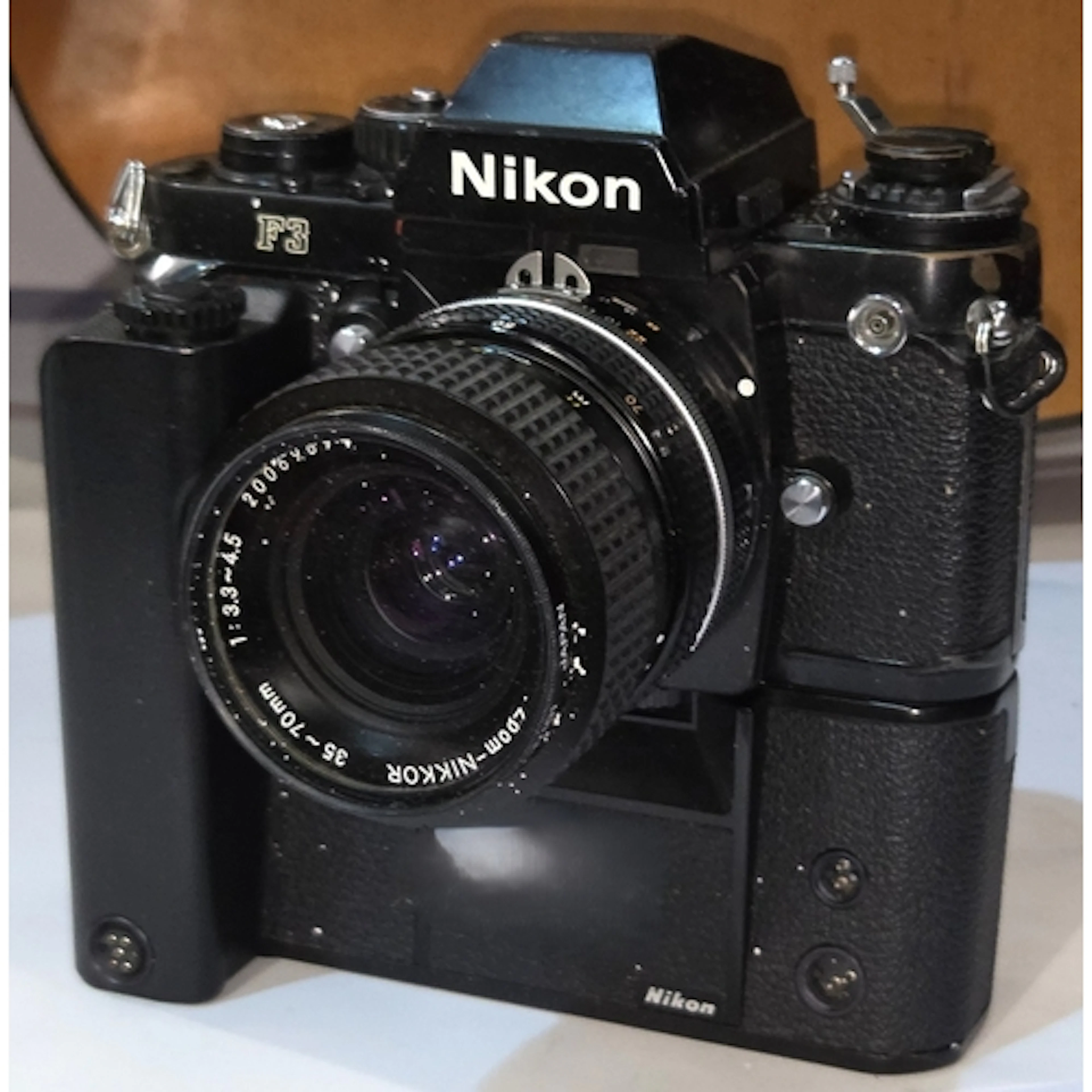 A vintage Nikon F3 SLR camera with 35~70mm lens with Nikon M...