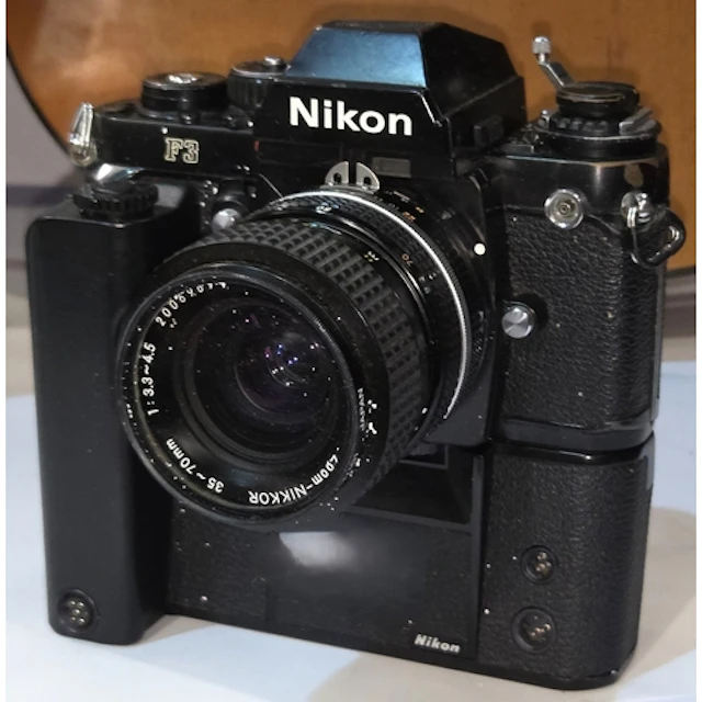 A vintage Nikon F3 SLR camera with 35~70mm lens with Nikon M...