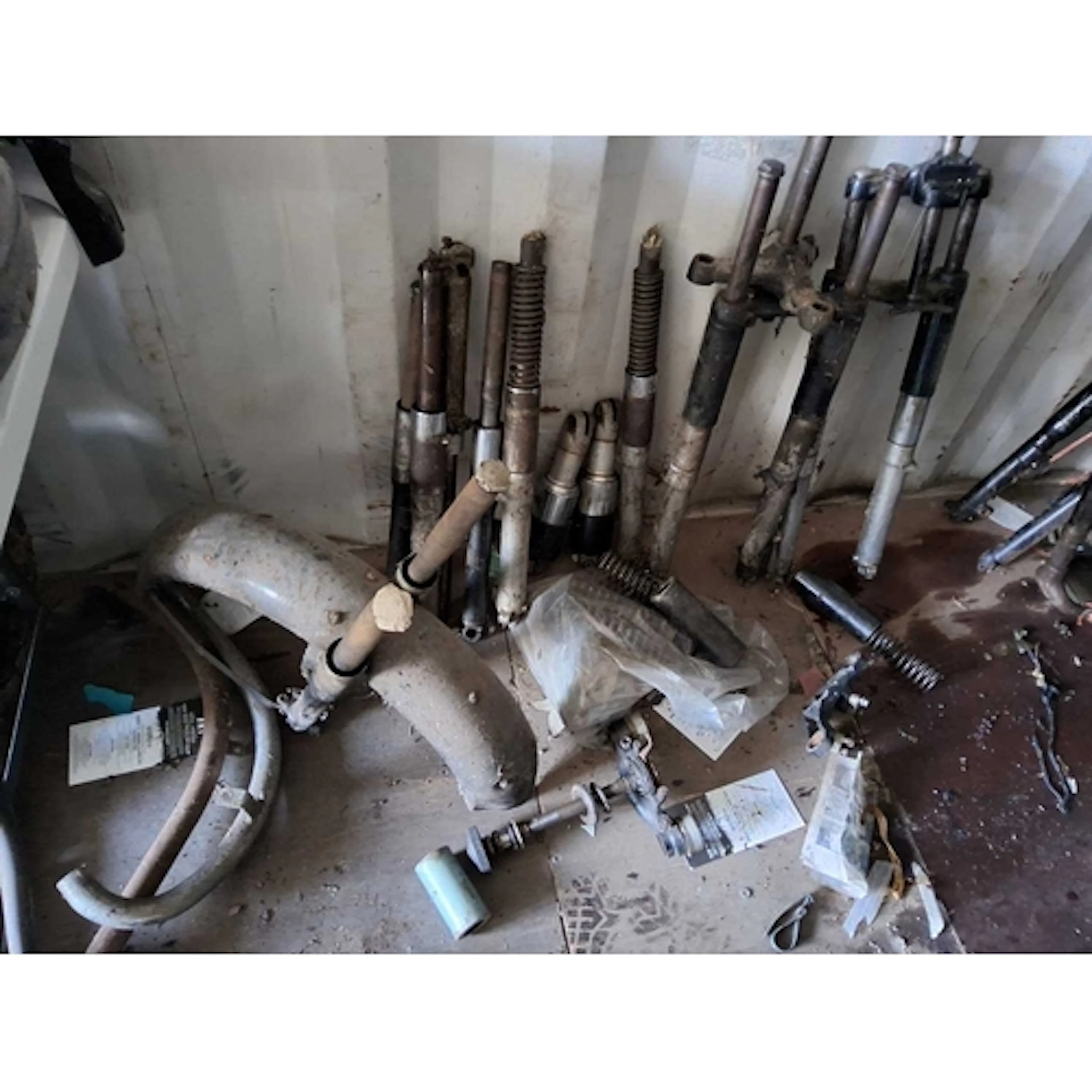 A COLLECTION OF VINTAGE BRITISH MOTORCYCLE FORKS, headraces,...