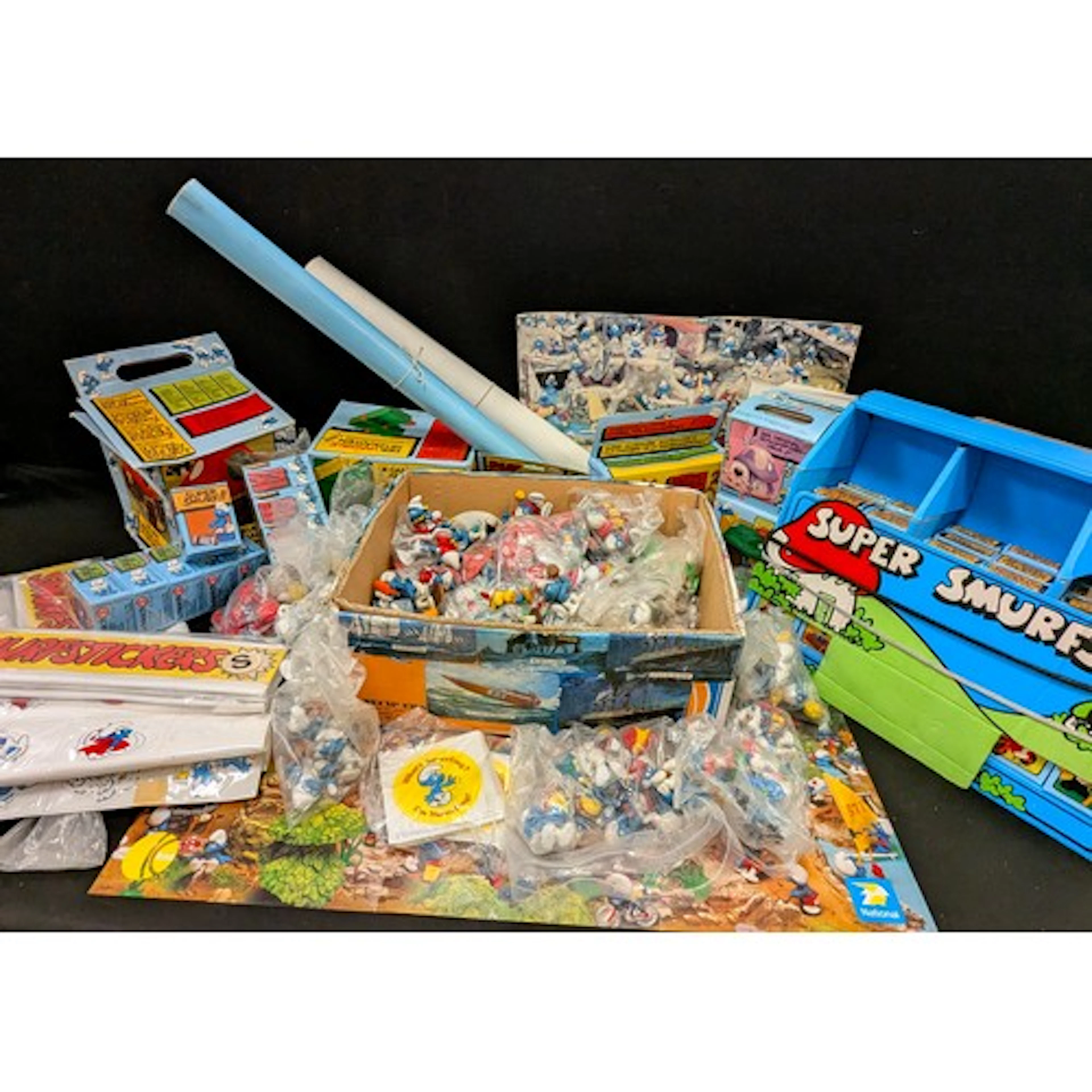An extensive collection of Schleich/Peyo Smurfs, part sealed...