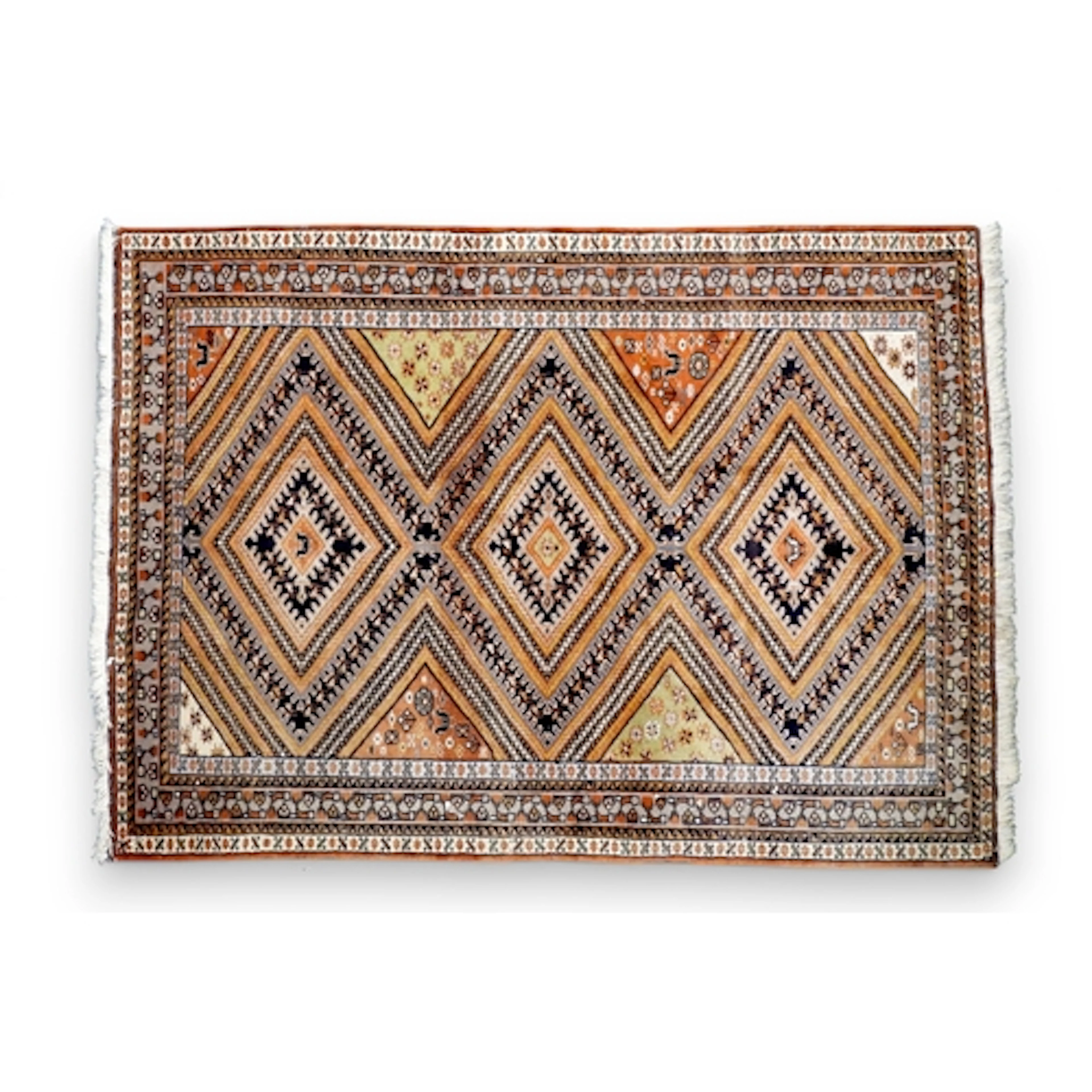 A multicoloured geometric patterned Shirvan rug with three d...