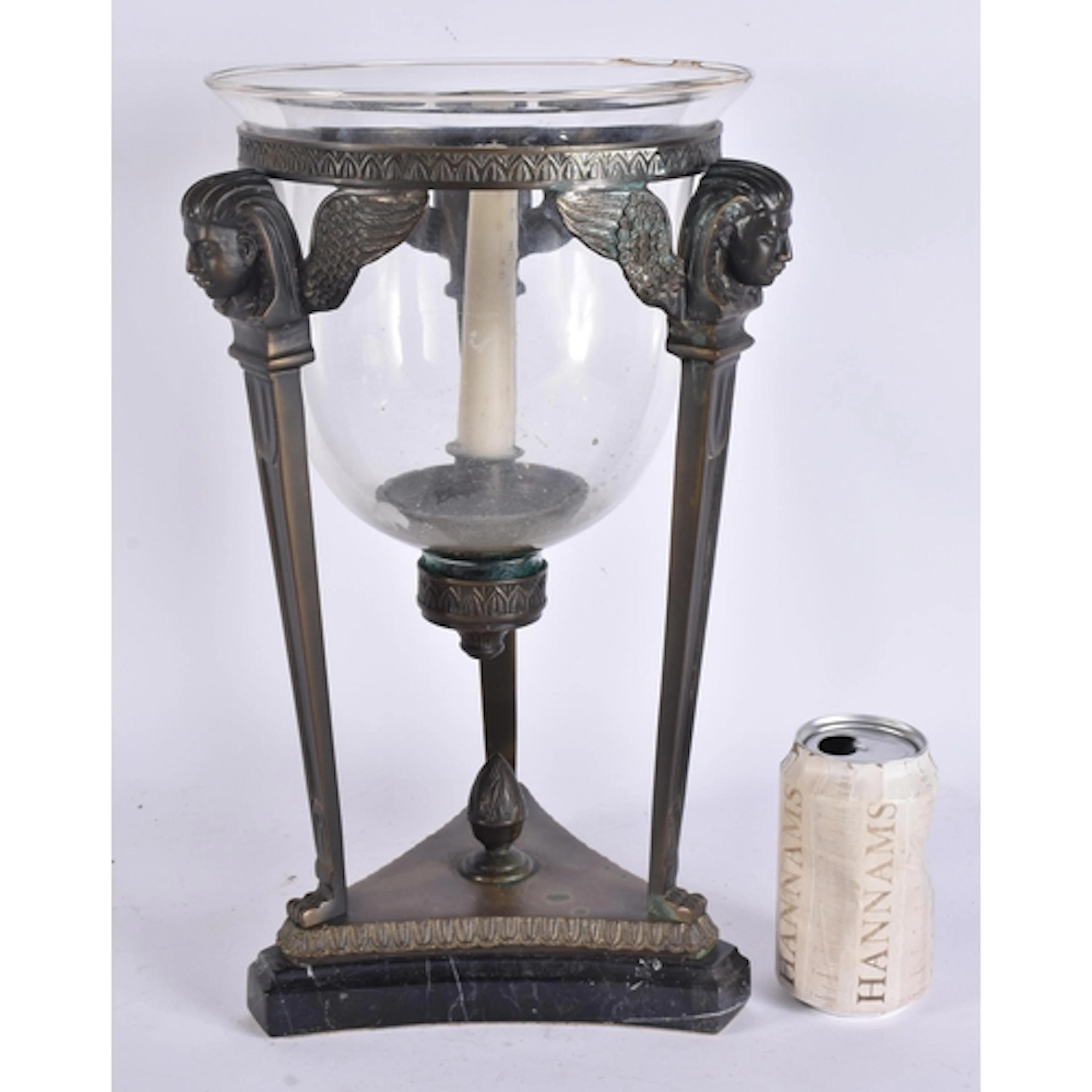 AN ART DECO FRENCH BRONZE EGYPTIAN REVIVAL GLASS CANDLE HOLD...