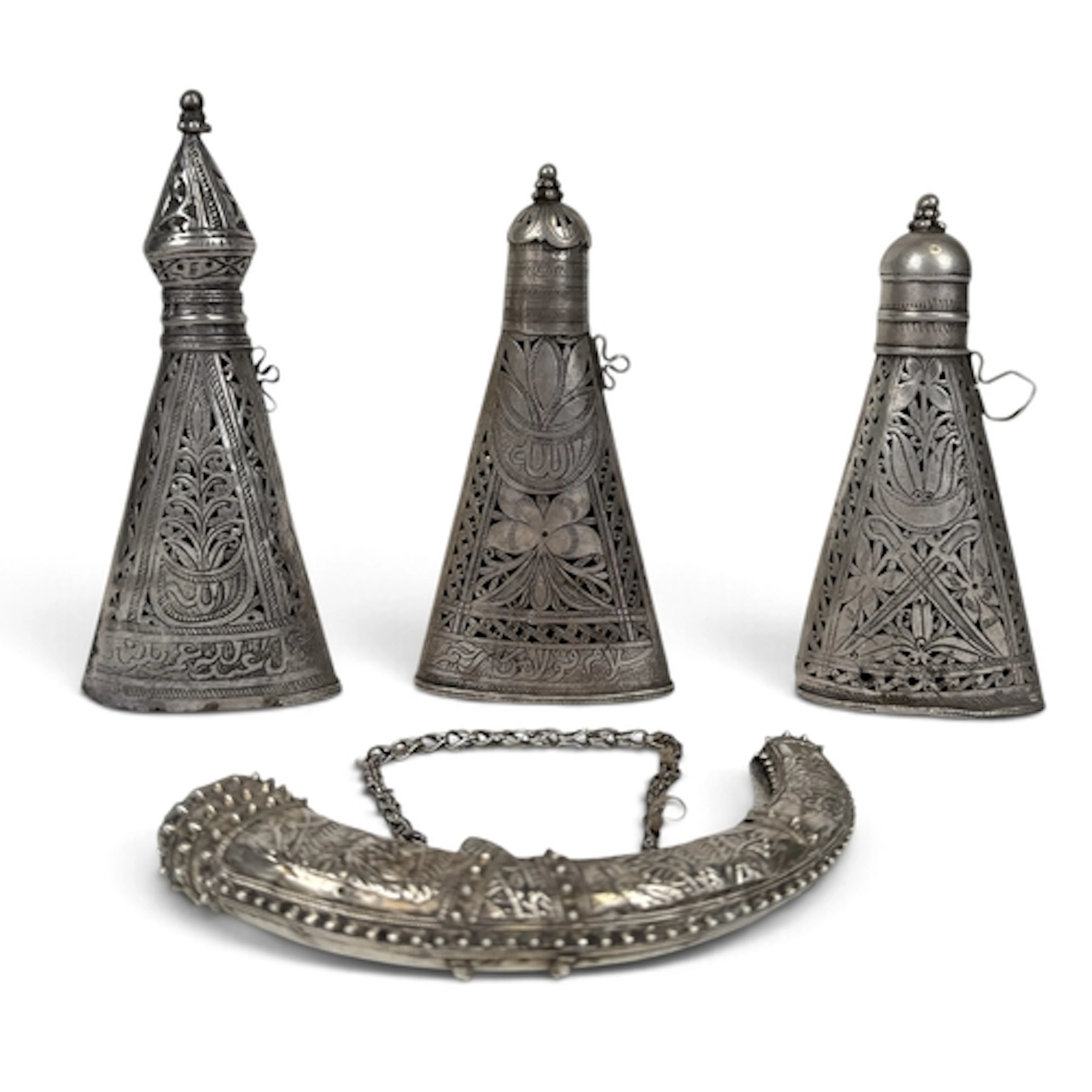 THREE OMAN SILVER SWORD SHEAF FITTINGS Together with a powde...